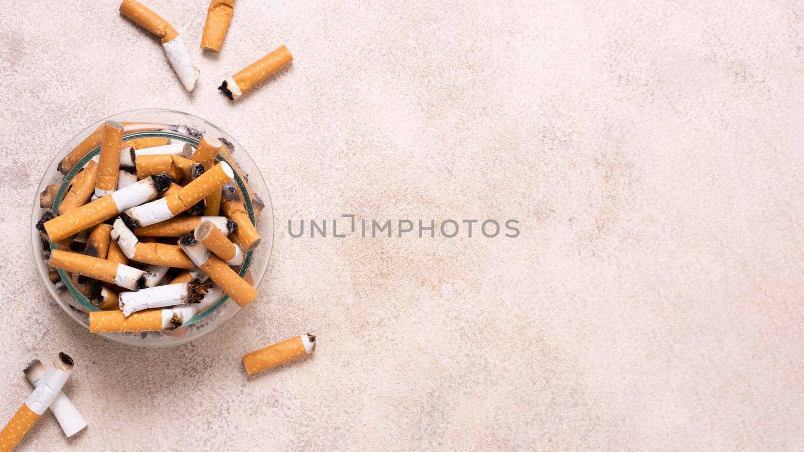 cigarette butts frame with copy space. High resolution photo