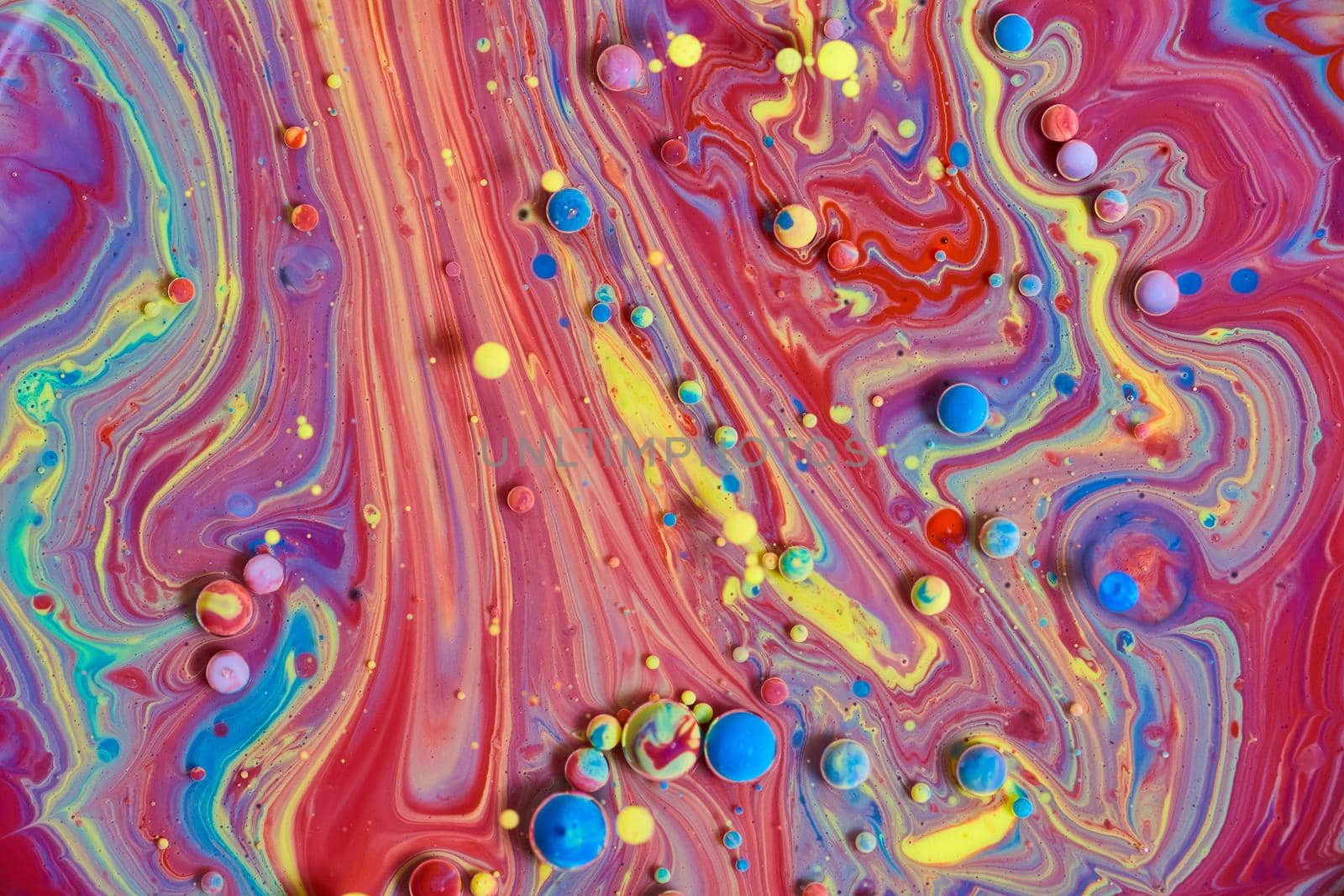 Image of Silky rainbow surface with tiny floating acrylic spheres