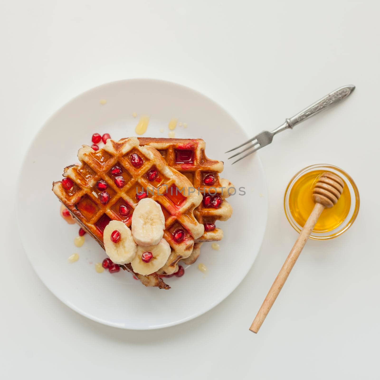 top view waffle with honey fork by Zahard