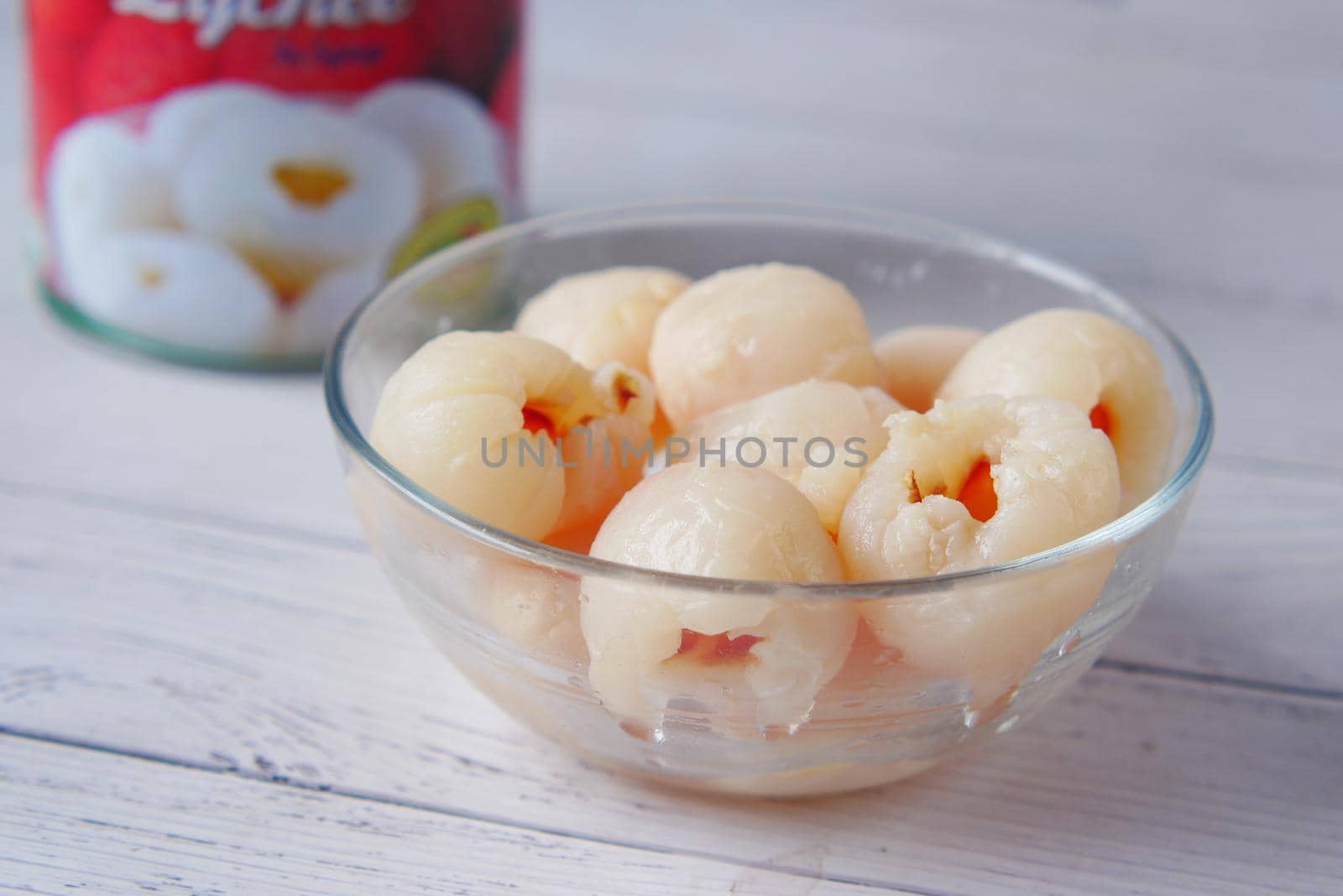 canned Lychee in bowl on table by towfiq007