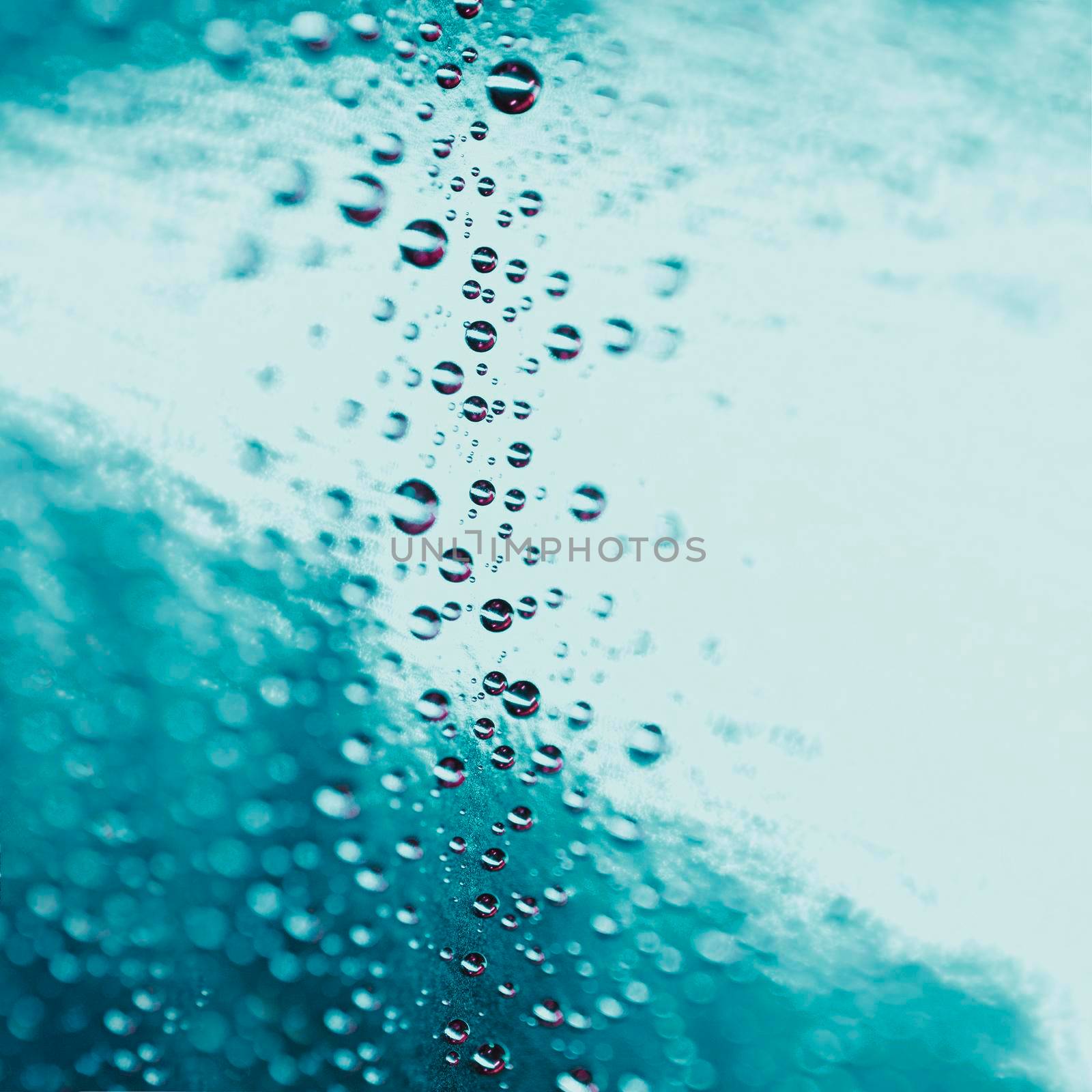 abstract water drops turquoise glass background. High resolution photo