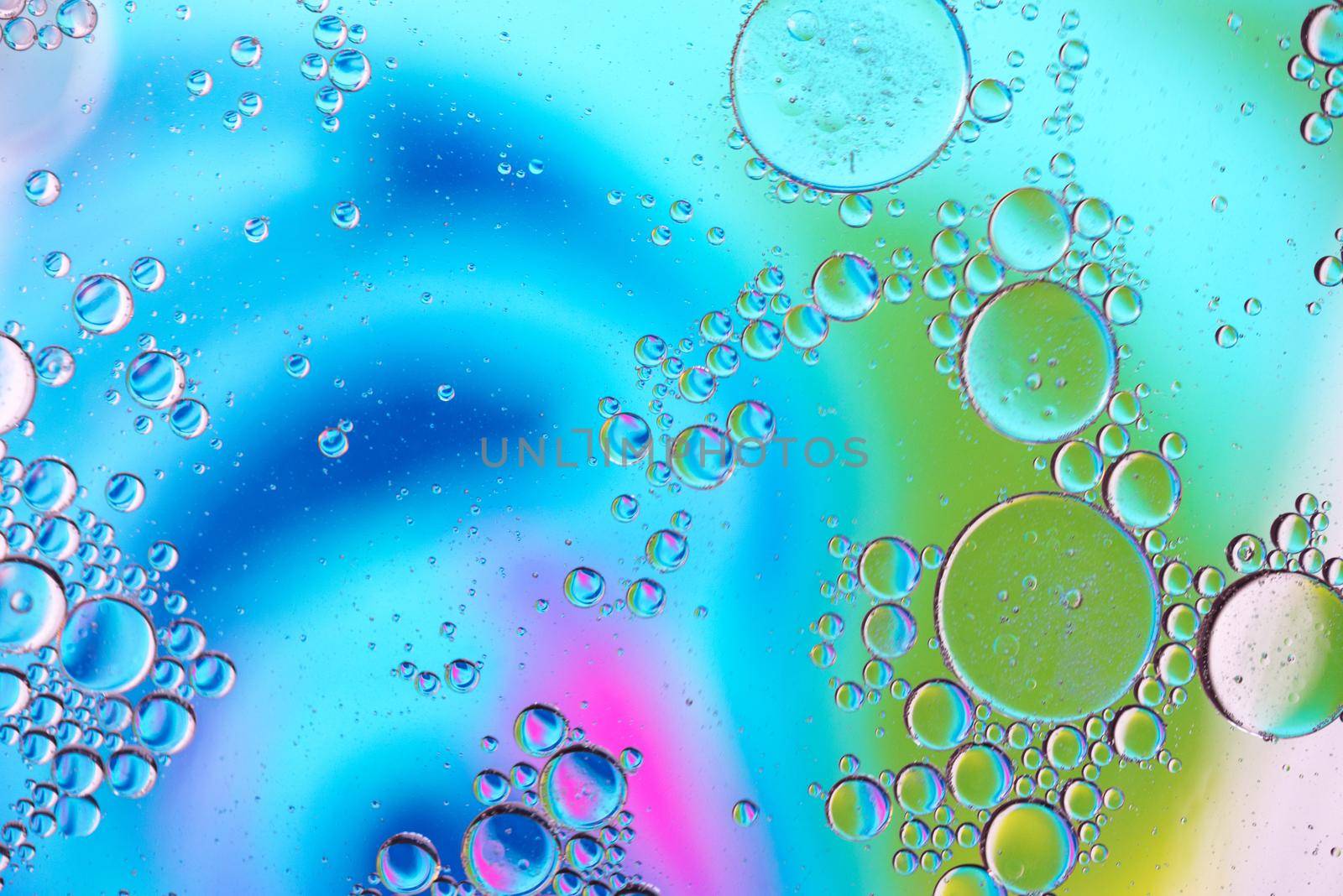 Defocused abstract background picture made with oil, water and soap by anytka