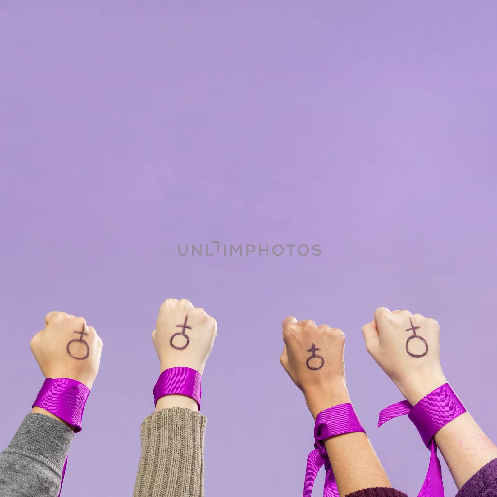 group female activists protesting together. High quality photo by Zahard