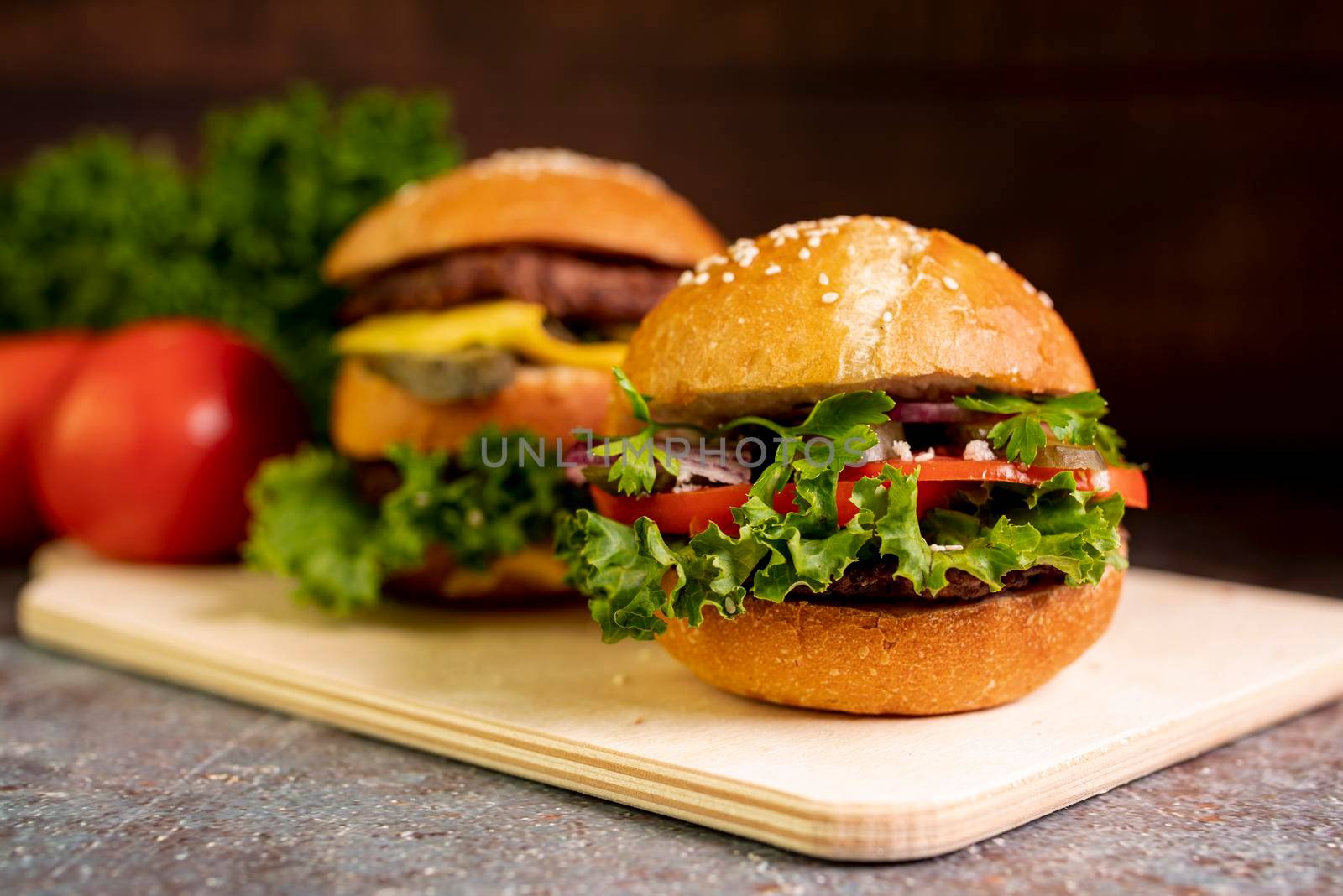 close up hamburgers cutting board. High resolution photo