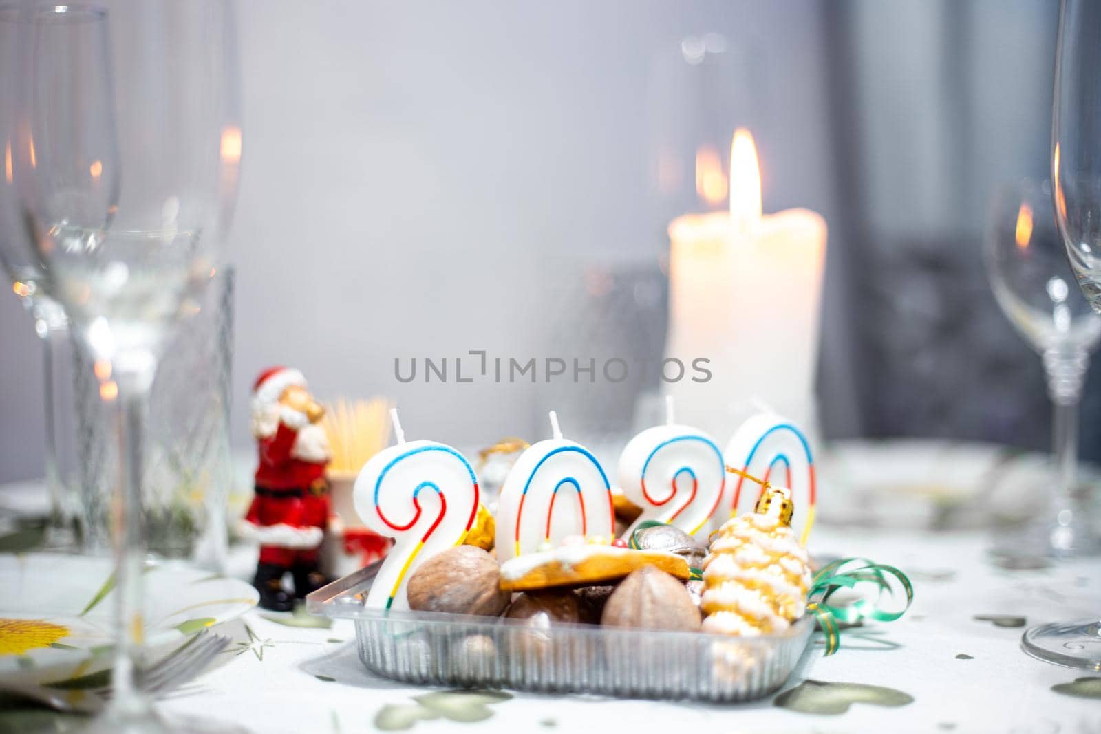 Christmas table with burning candles by levnat09
