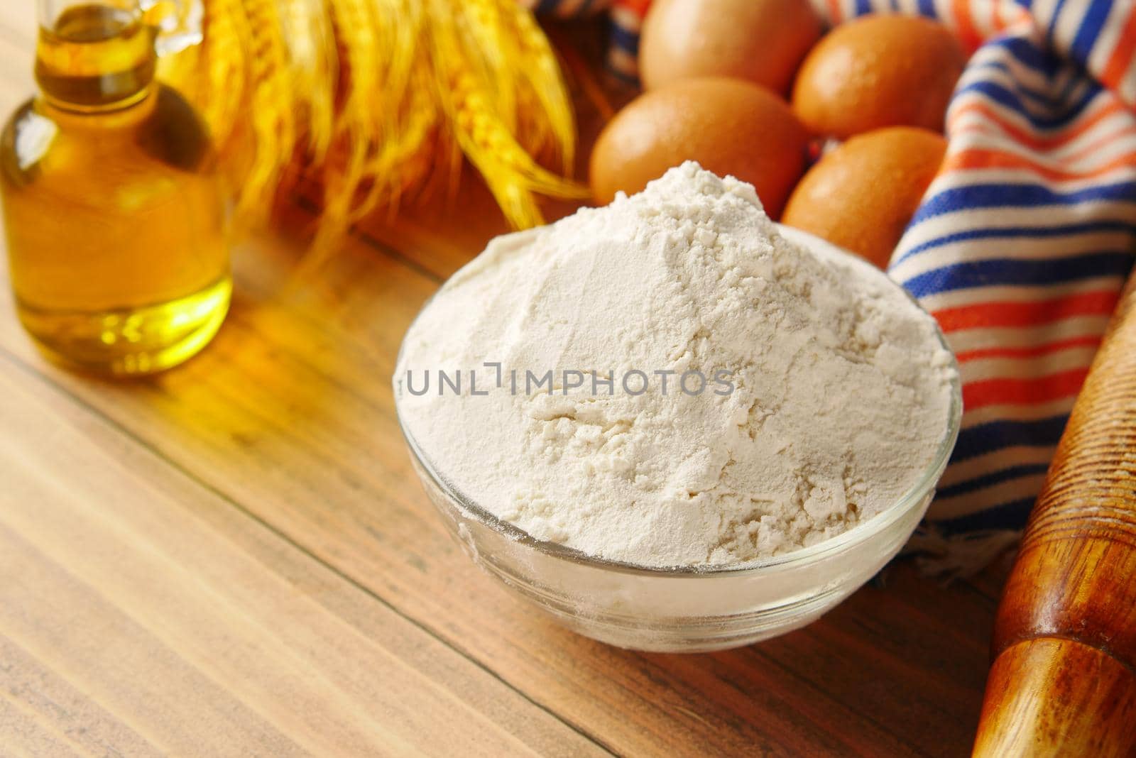 wheat flour in a bowl on table ,