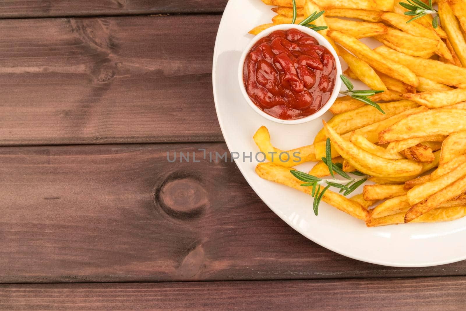plate with yummy french fries ketchup. High resolution photo