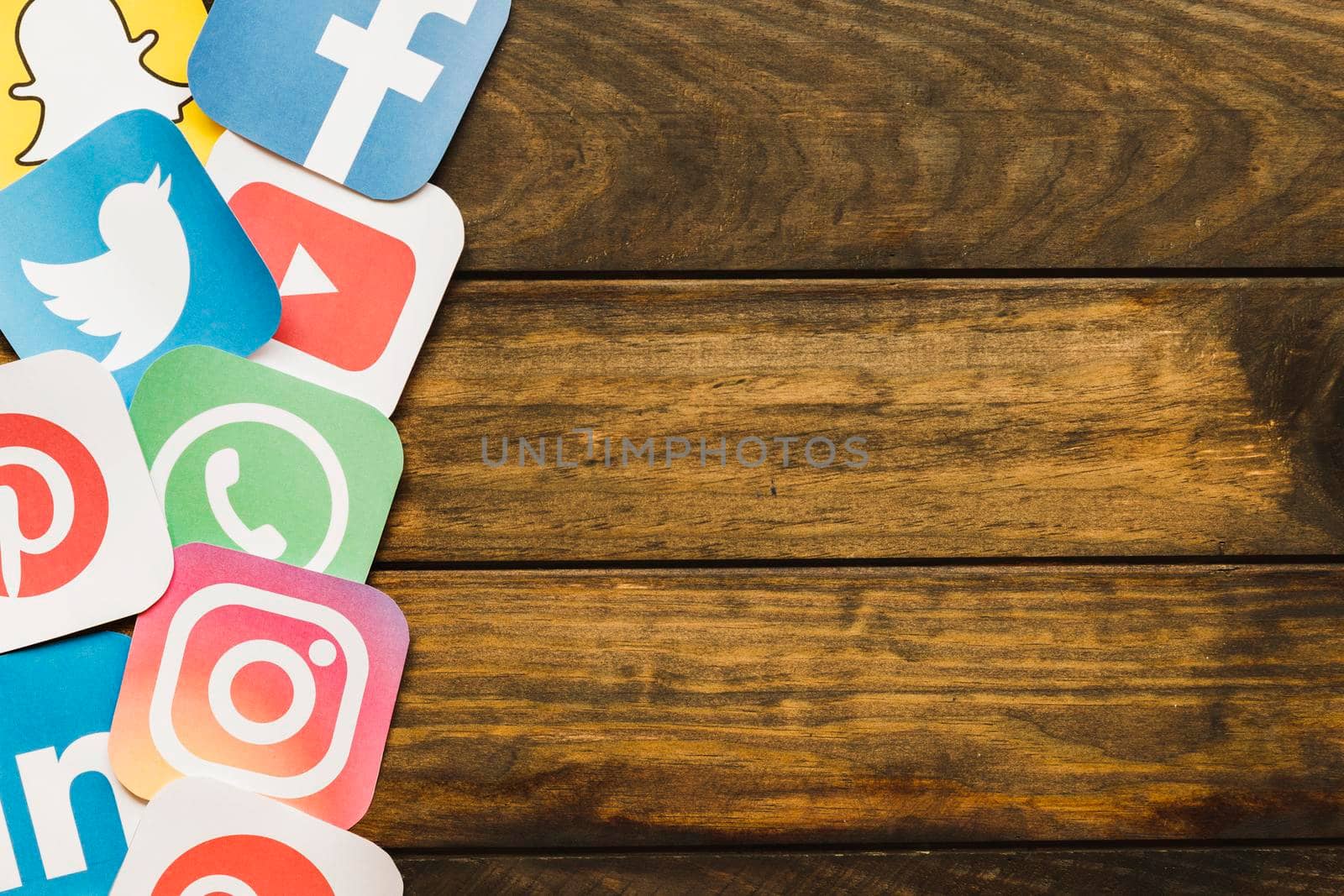 elevated view various mobile icons plywood. High resolution photo