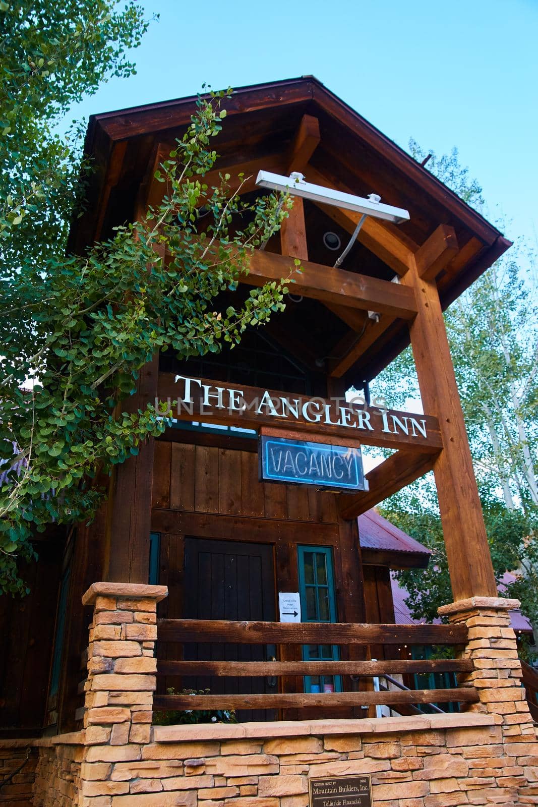 Image of The Angler Inn hotel log cabin in the mountains