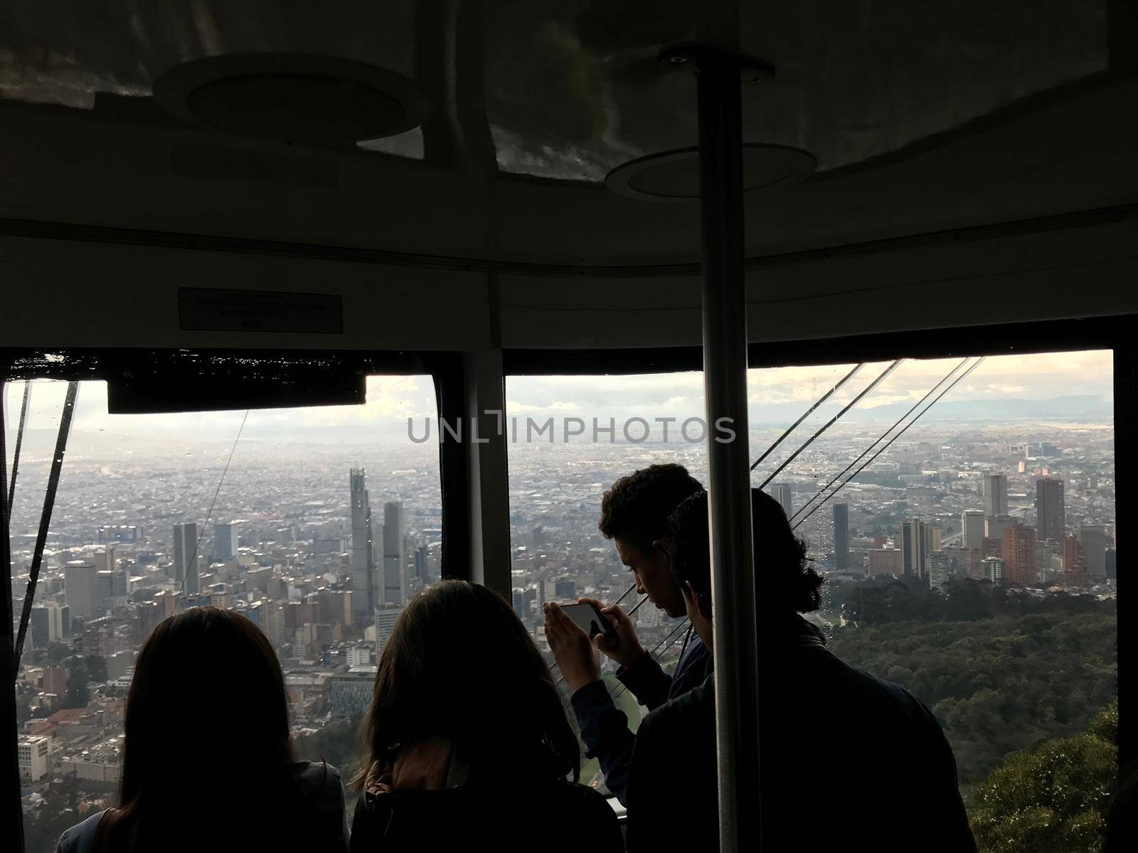 Cable car climbing Mount Monserrate looking out over Bogota, Colombia. by jyurinko