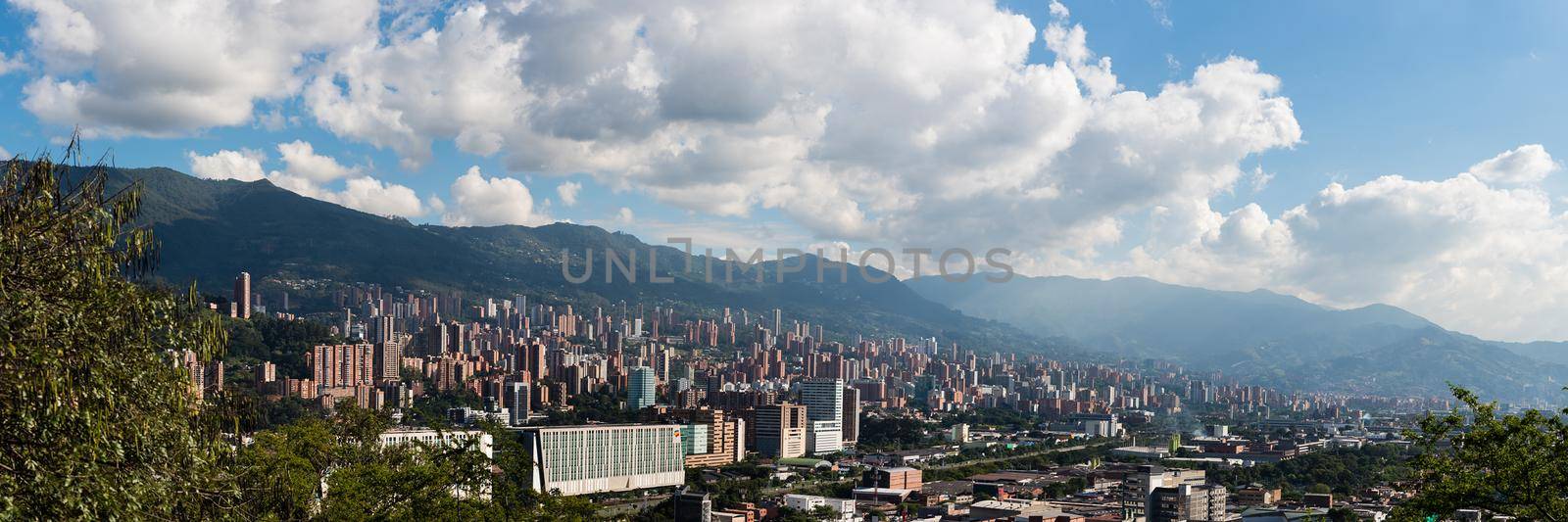 Panoramic view of Bogota Colombia. Puffy clouds and blue sky