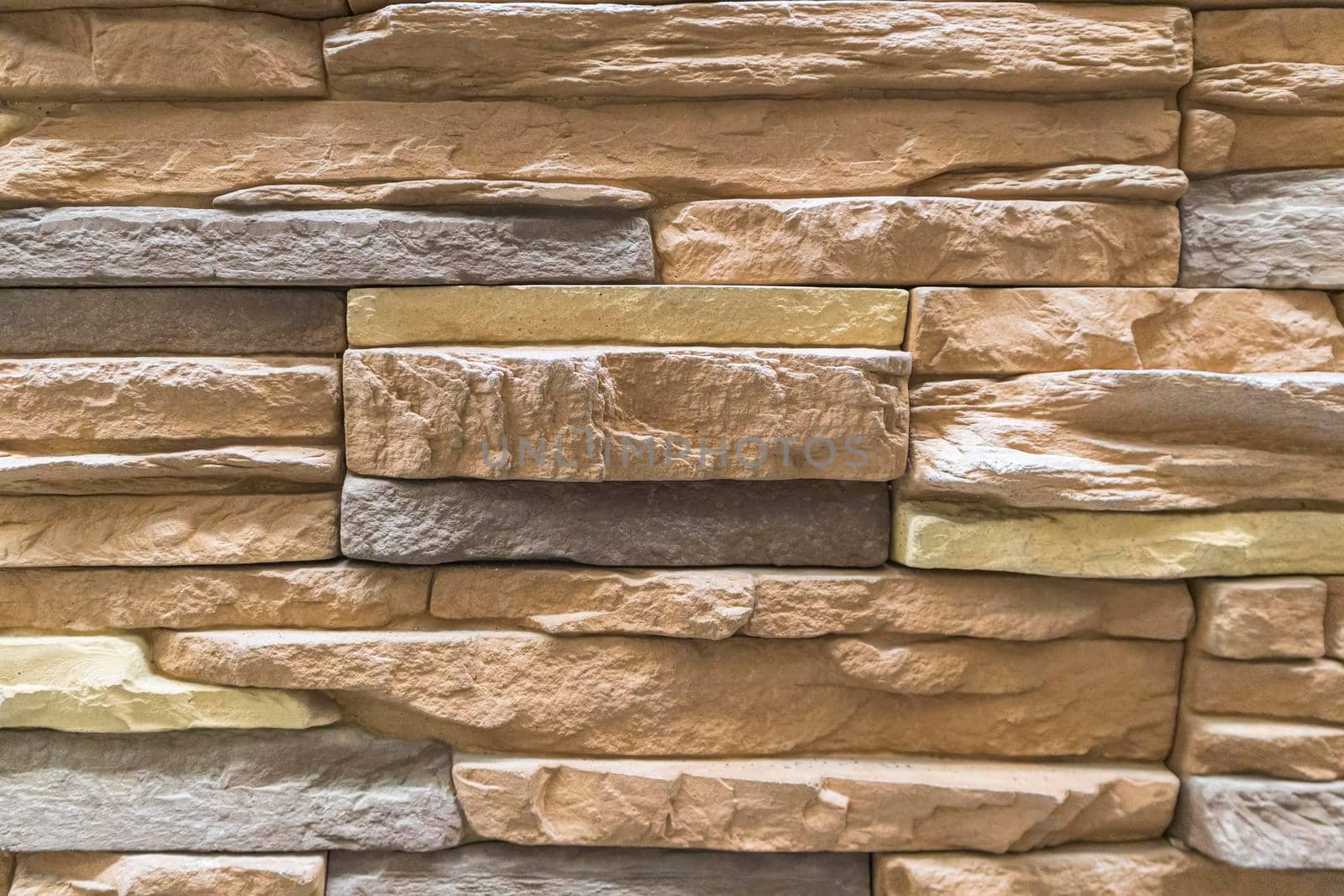 masonry wall paving stones as a background close up. High quality photo