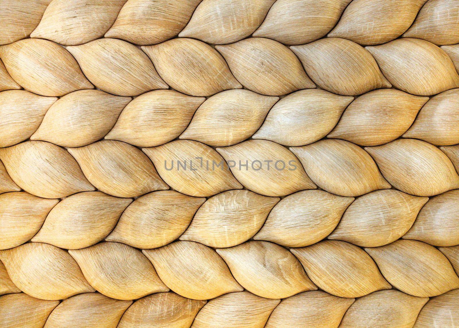 Traditional ecological consistent cladding of a wall with brown wooden larch fish scales, wood shingles, clapboard, clapboard texture background side view