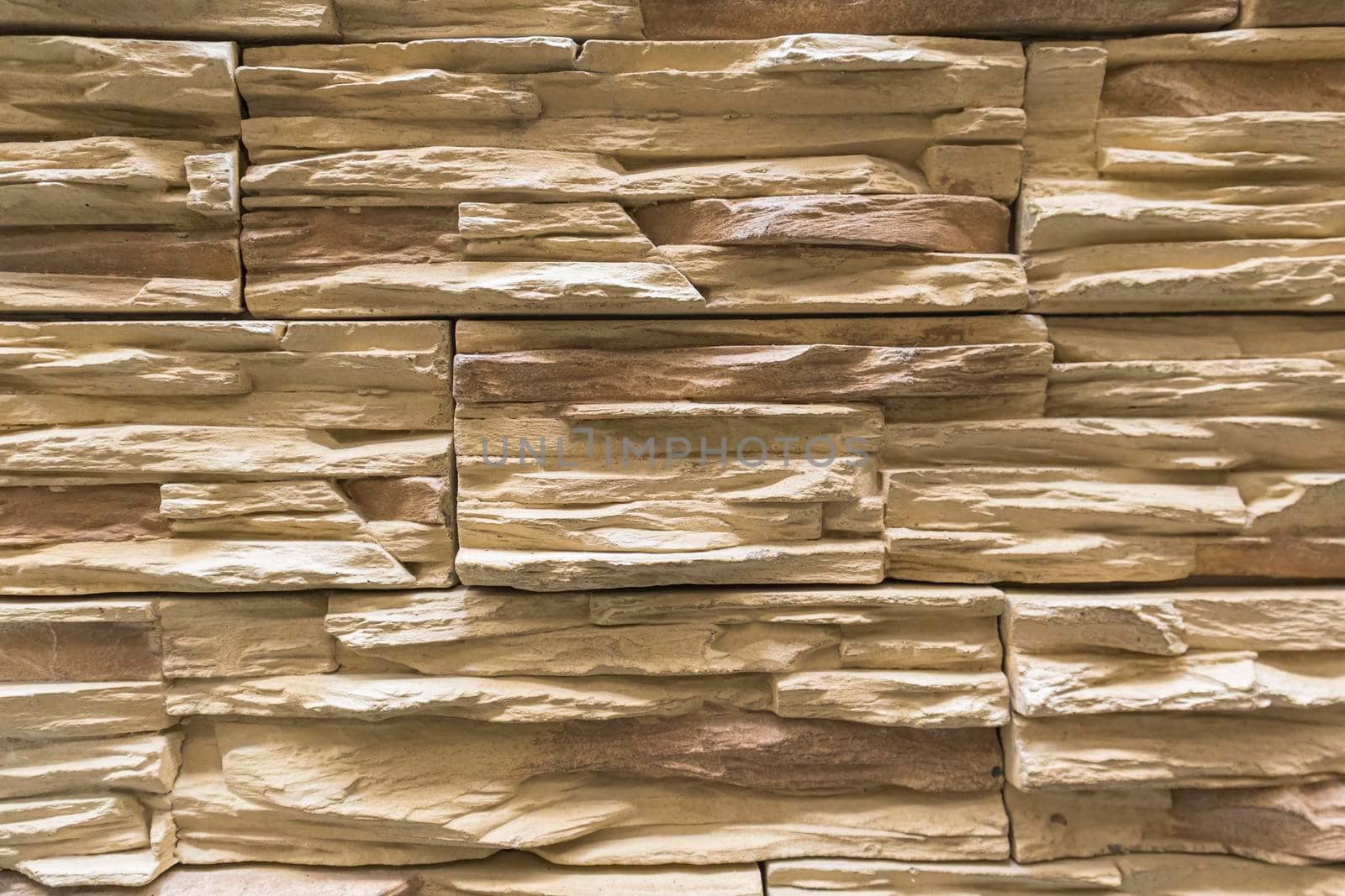 masonry wall paving stones as a background close up by roman112007