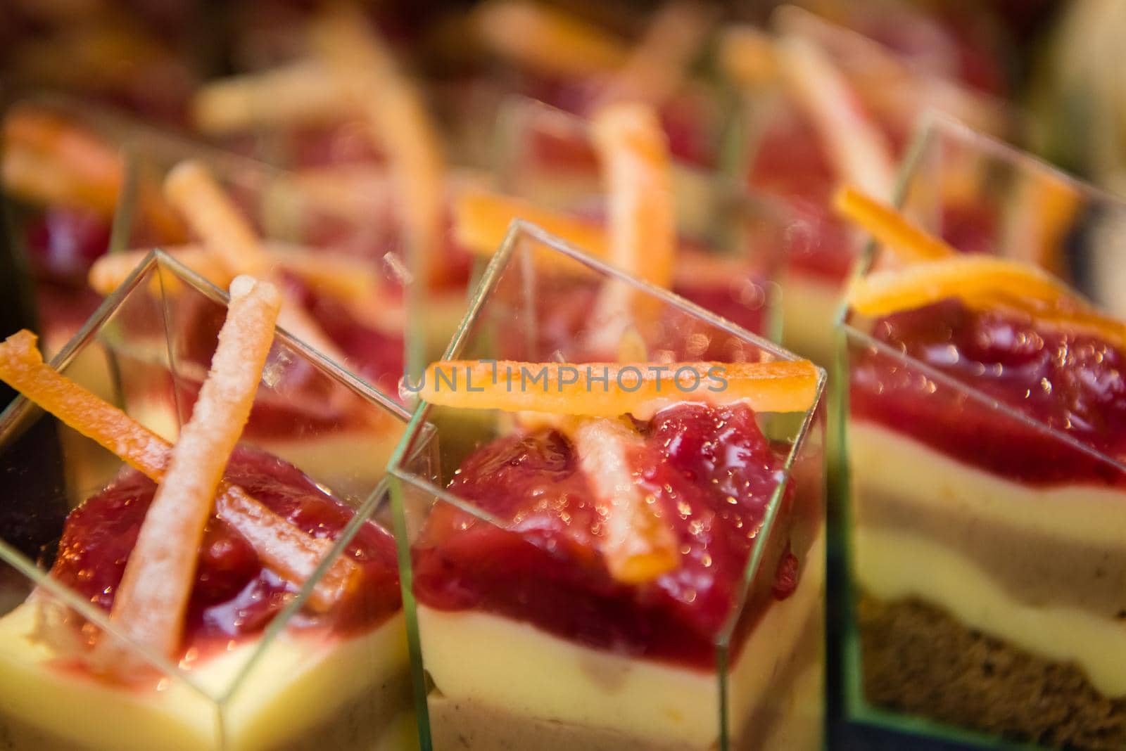 Dessert with strawberry topping. Close up