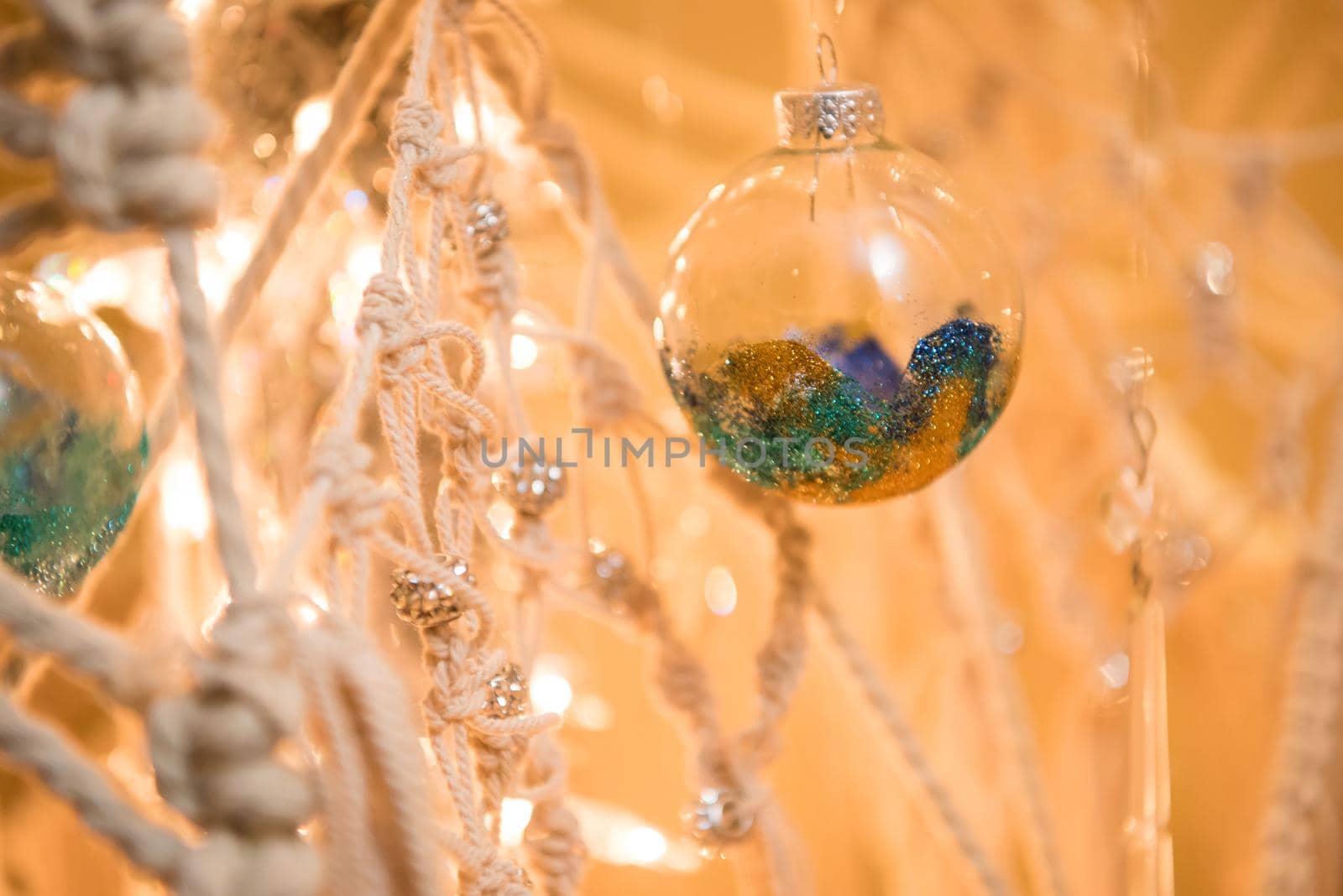 Christmas tree ornaments with clear bulb. Close up by jyurinko