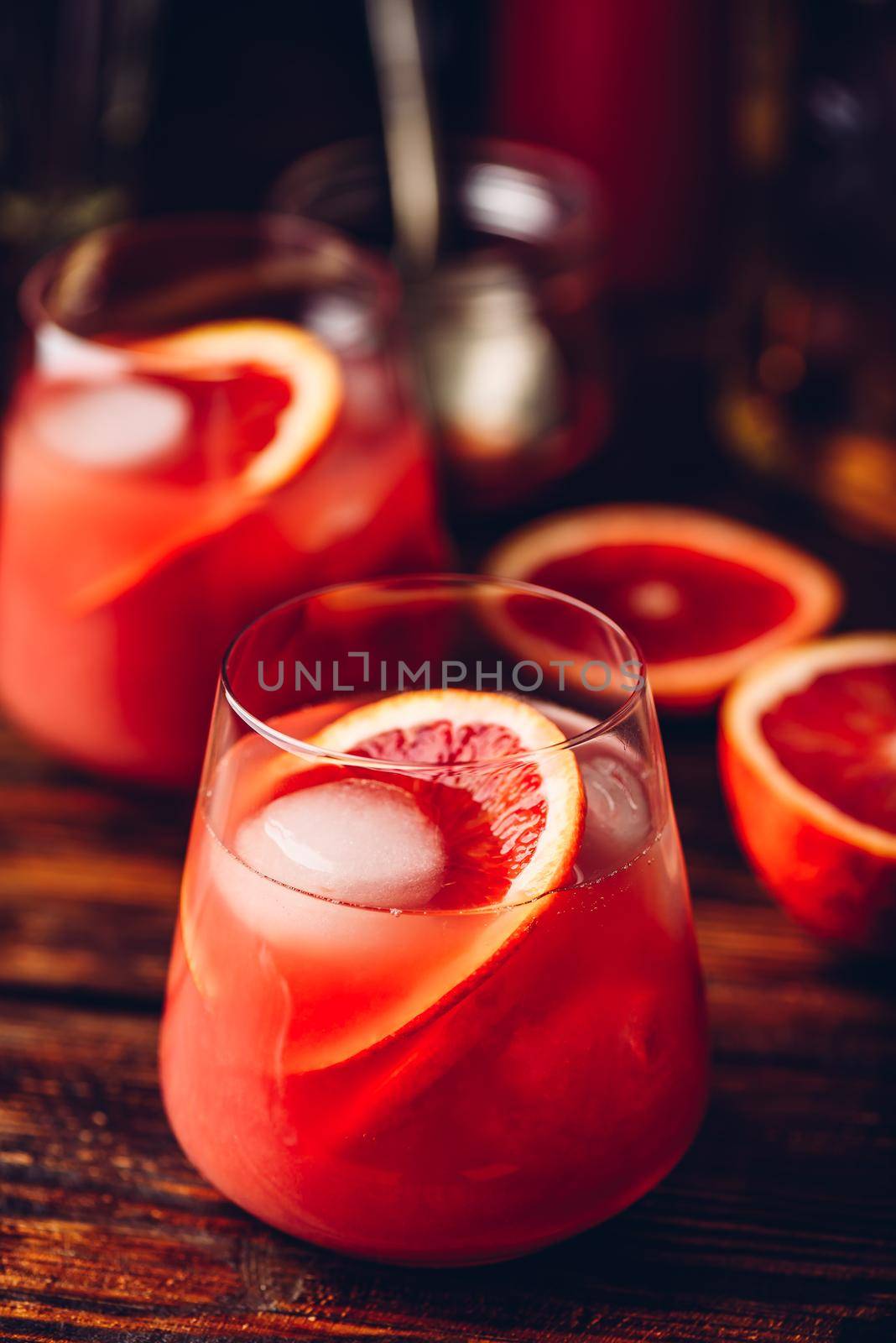 Whiskey sour cocktail with aged bourbon, blood orange juice and cherry syrup