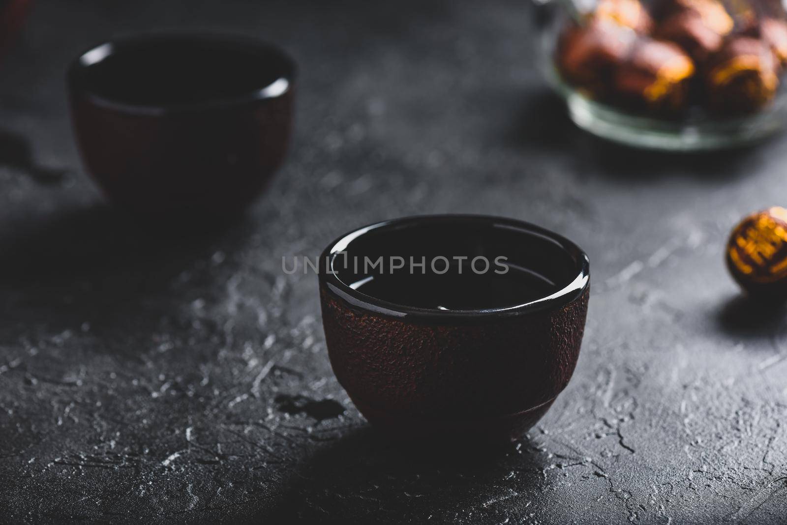 Ready red tea in two tea bowls
