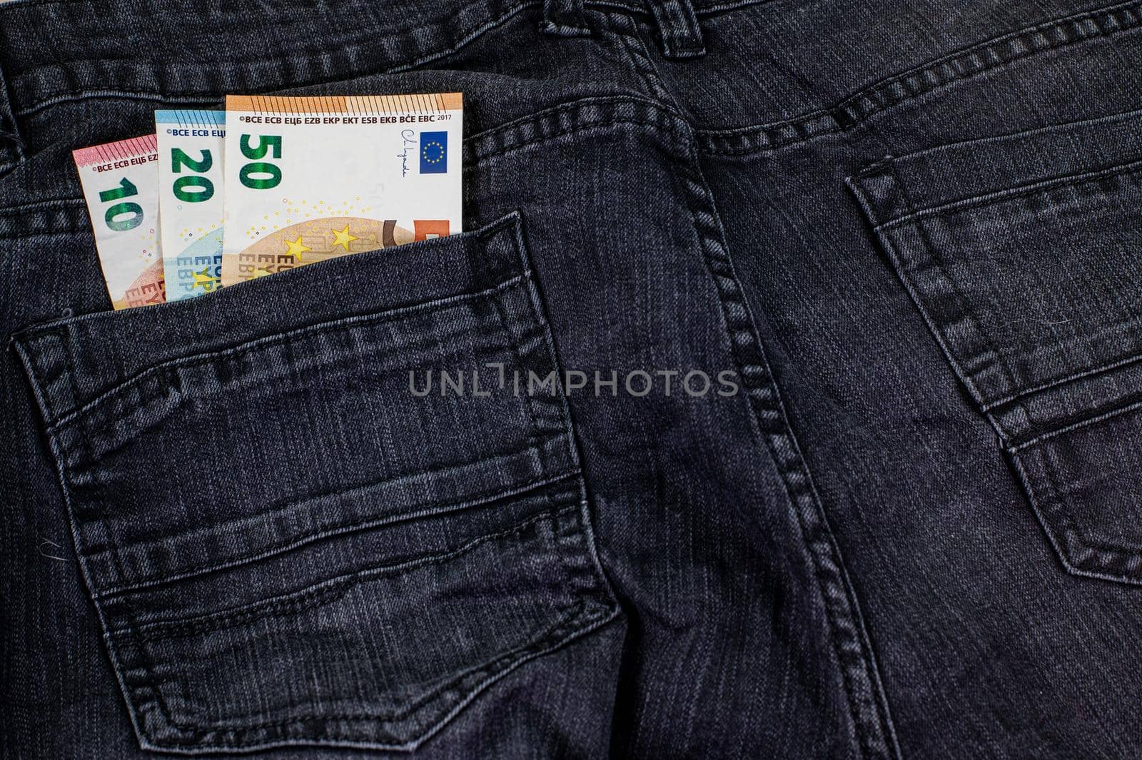 10 20 50 euros that come out of the jeans pocket by carfedeph