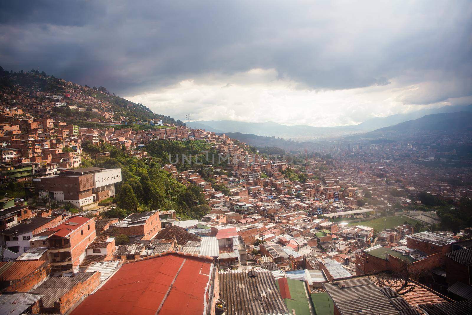 Cable car route over many red roof homes by jyurinko