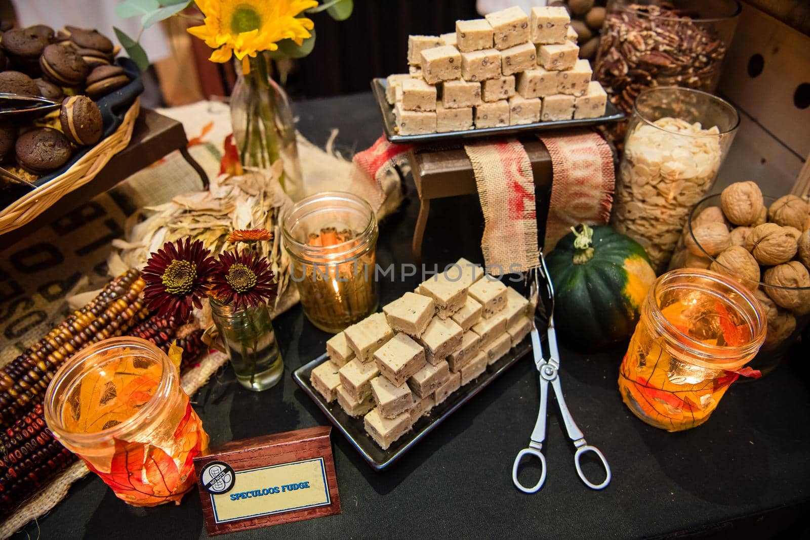 Autumn food spread with fudge flowers and leaf decor. by jyurinko