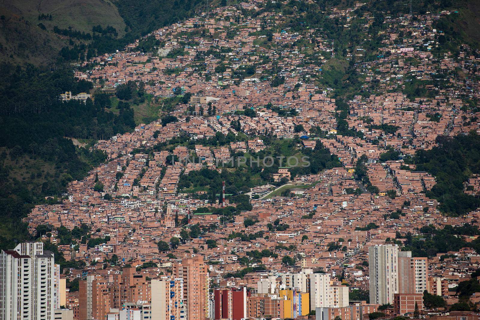 Rolling hills and village of Bogota Colombia. by jyurinko