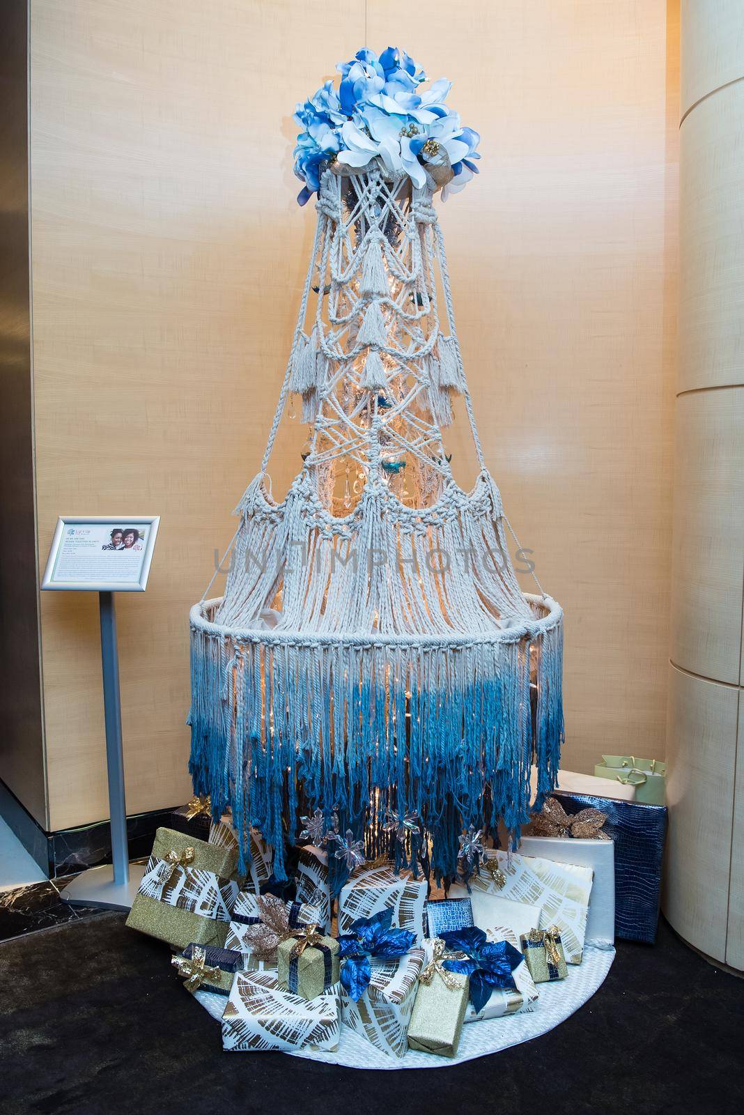 Homemade chandelier Christmas tree with blue and white flowers and rope. by jyurinko