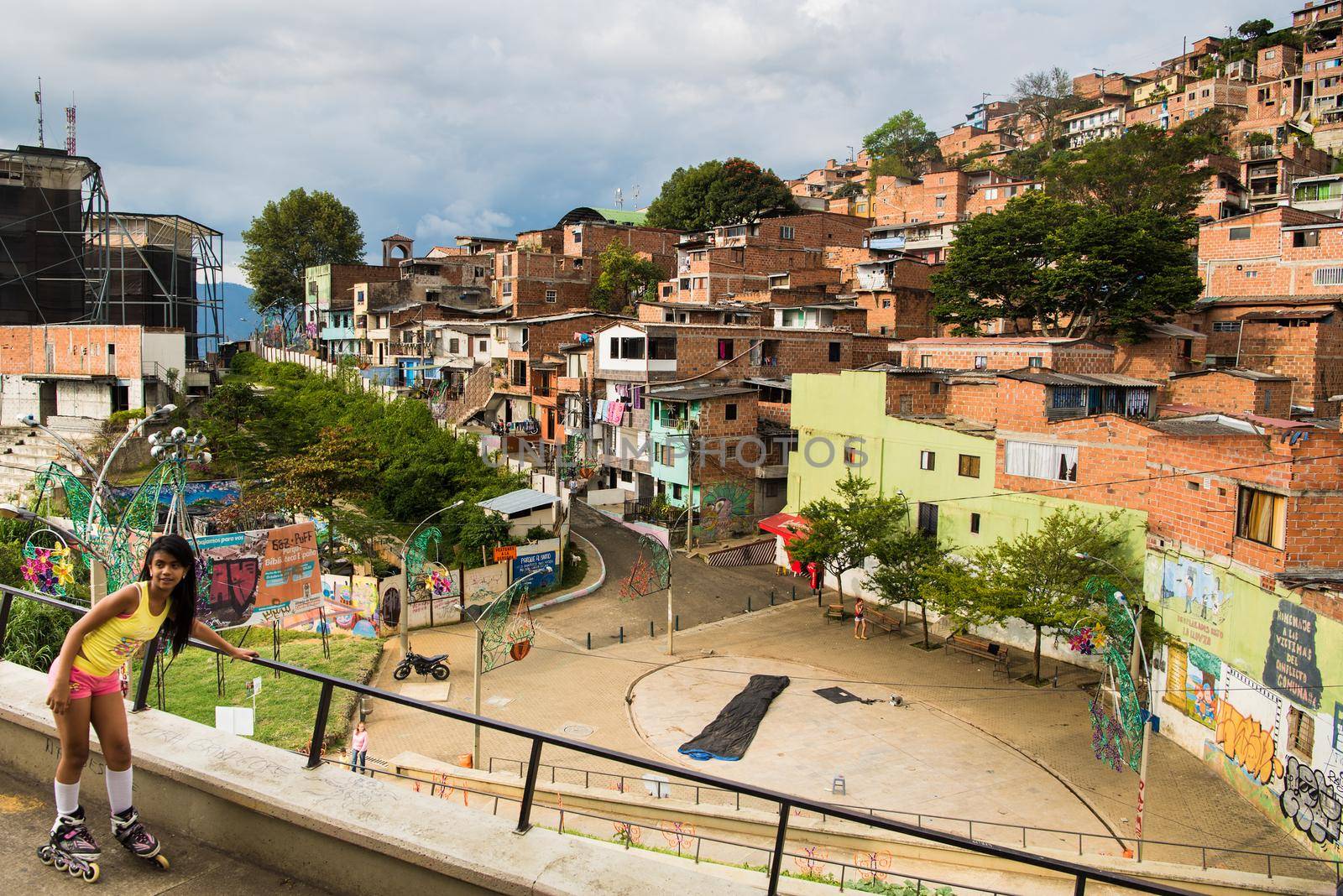 Neighborhood in Medellin, Colombia with view of homes on hillside.