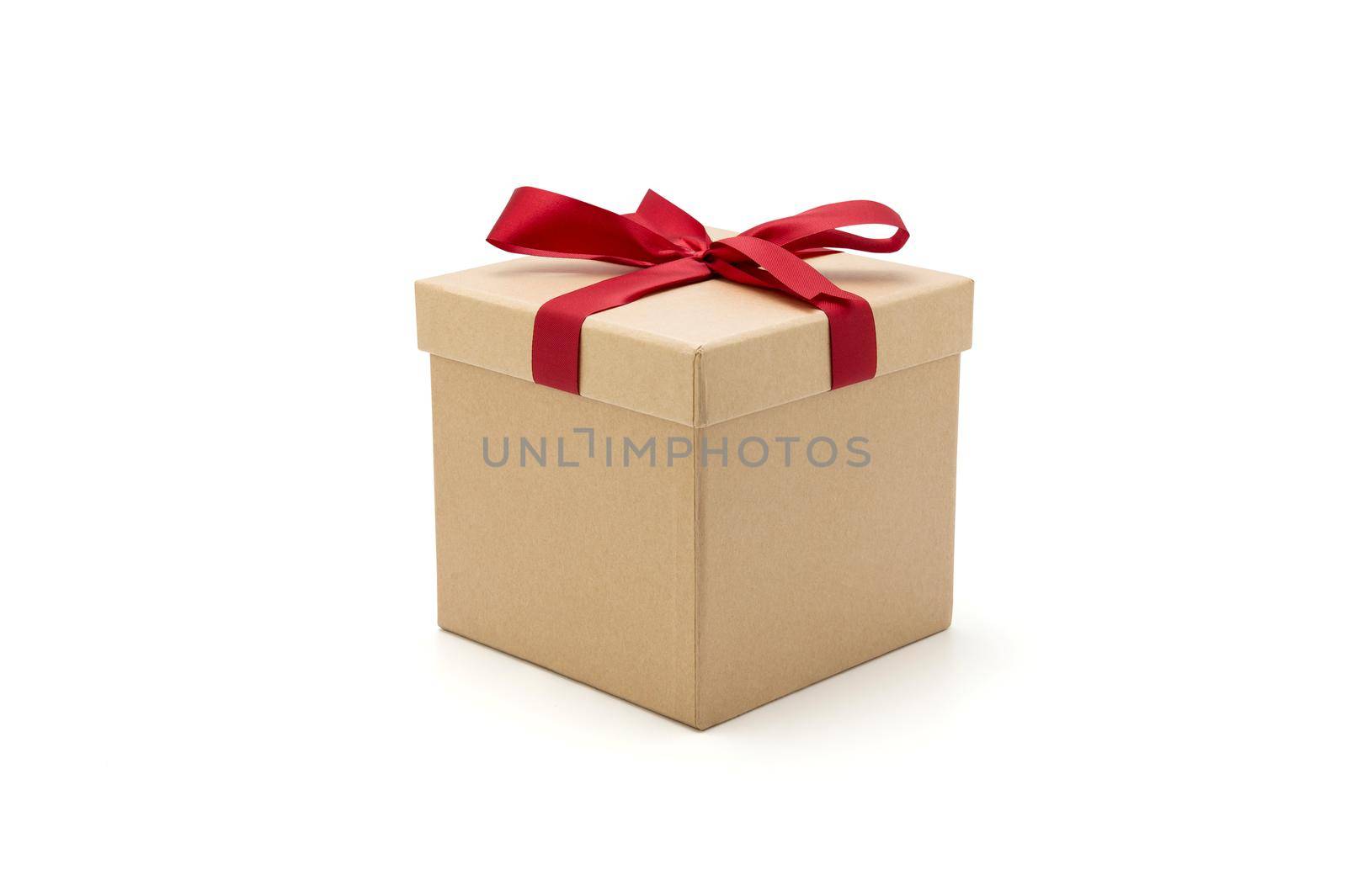 Gift box kraft on isolated on white background with romantic, presents for Christmas day or valentine day, package with congratulation, wrapped paper, spring for decoration, copy space, holiday concept.