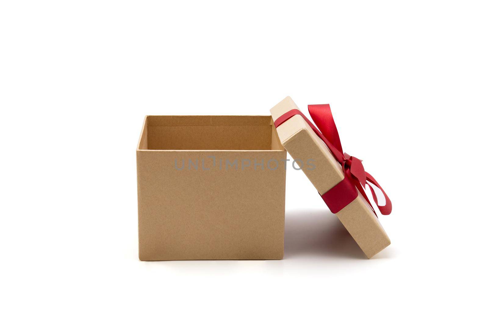 Gift box open lid on isolated on white background with romantic, presents for Christmas day or valentine day, package with congratulation, wrapped paper, spring for decoration, copy space, holiday concept. by nnudoo