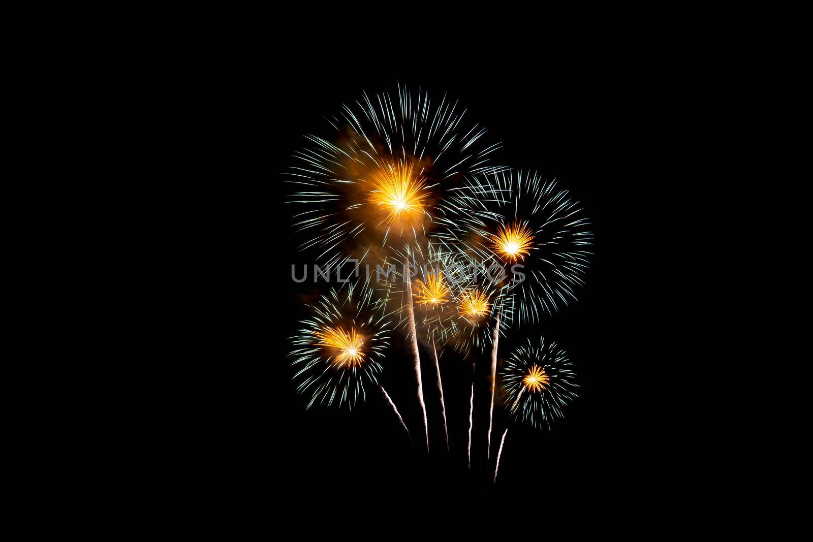 Many flashing colorful fireworks in event amazing with black background celebrate New Year, holiday and festival in night.