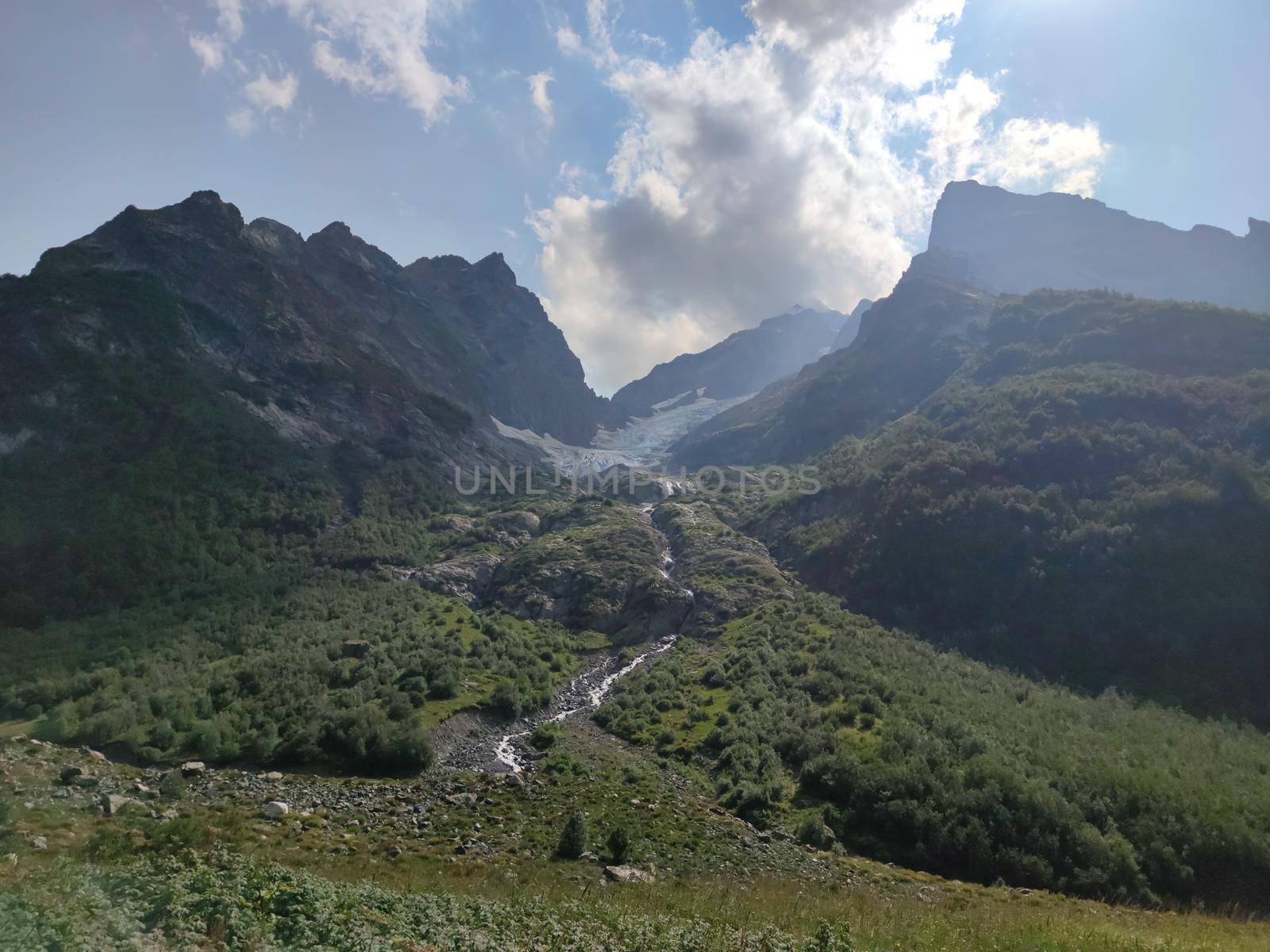 Summer mountains valley canyon wide summer panorama North Caucasus landscape, Dombai, Russia.