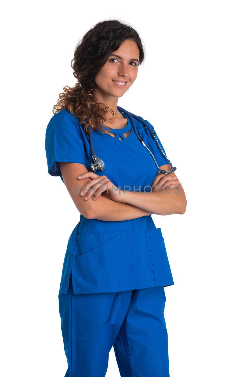 Female nurse in blue uniform with stethoscope standing with arms crossed isolated on white background
