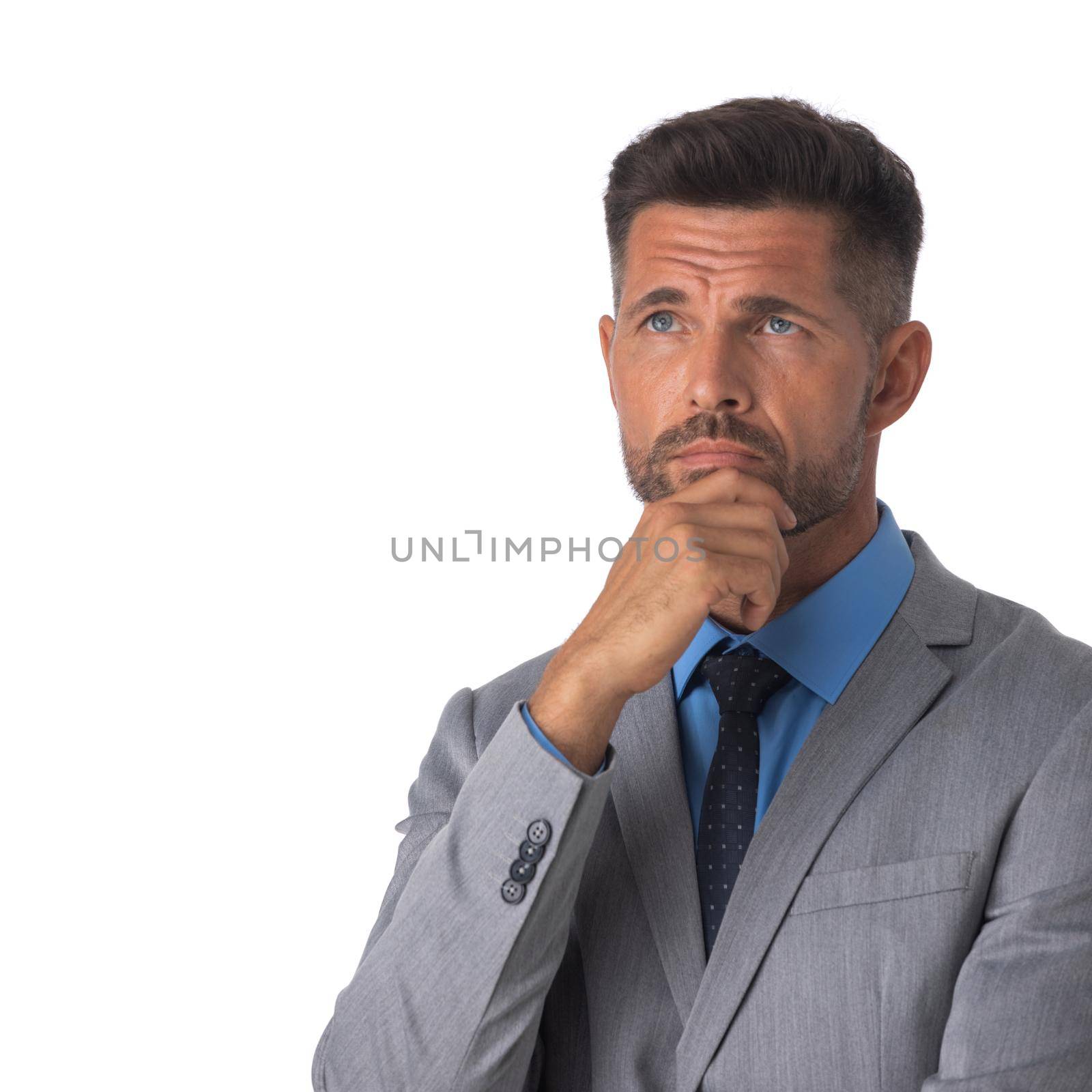 Handsome mature business man look up to empty copy space, businessman think, idea, hold hand on chin wear elegant suit isolated on white background