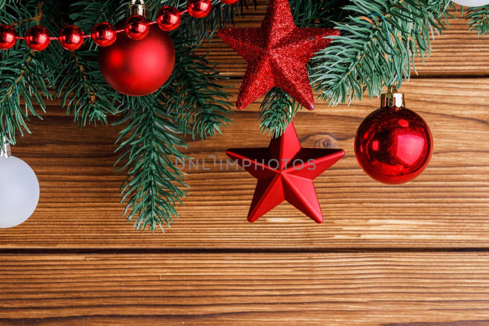 Old grunge wooden board with Christmas border.