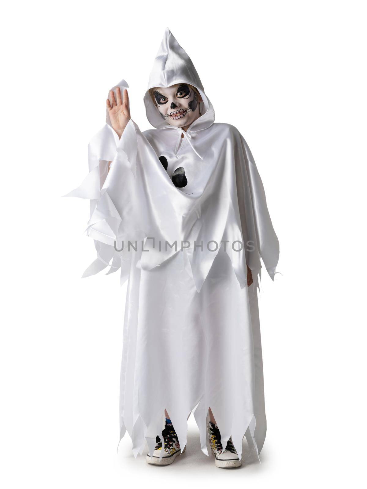 Funny halloween kid in costume with raised arm, waving hello, skeleton, zombie, ghost, wizard isolated on white background
