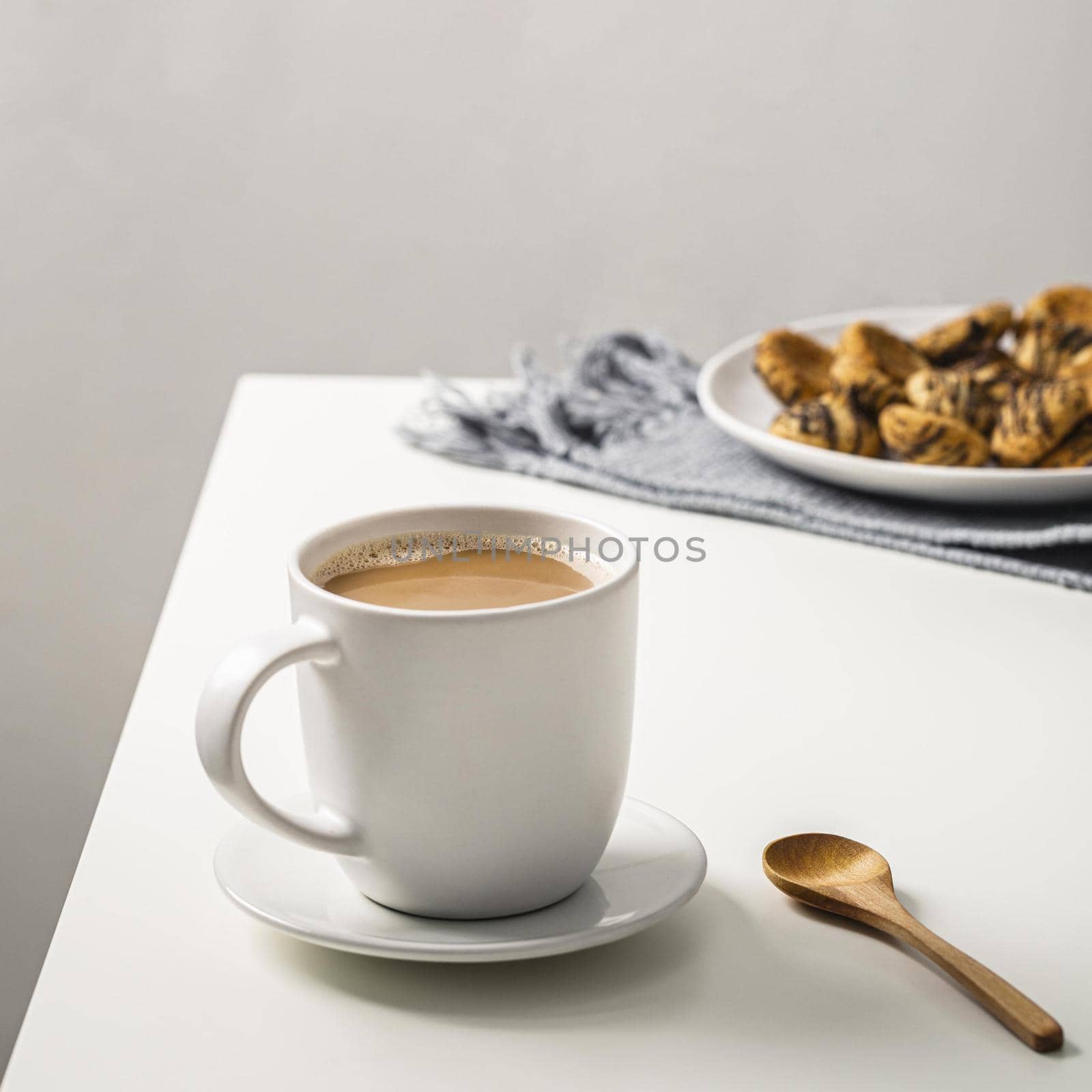 coffee mug table with cookies plate spoon. High quality beautiful photo concept by Zahard