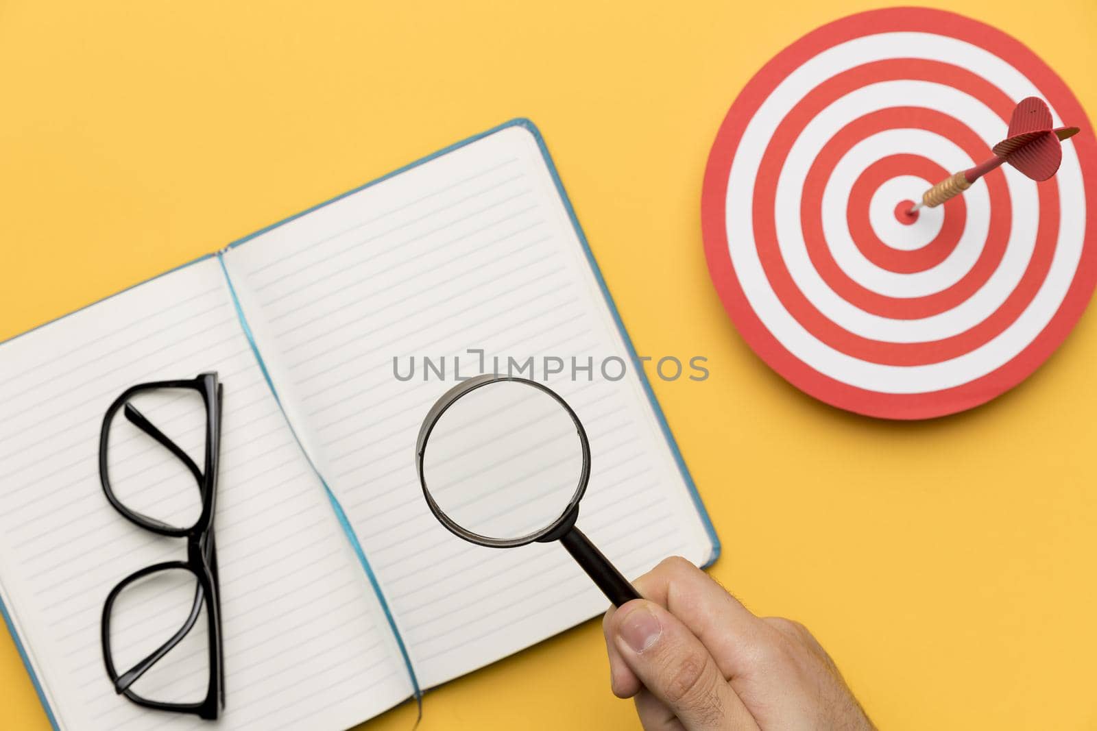 agenda with dartboard magnifier. Resolution and high quality beautiful photo