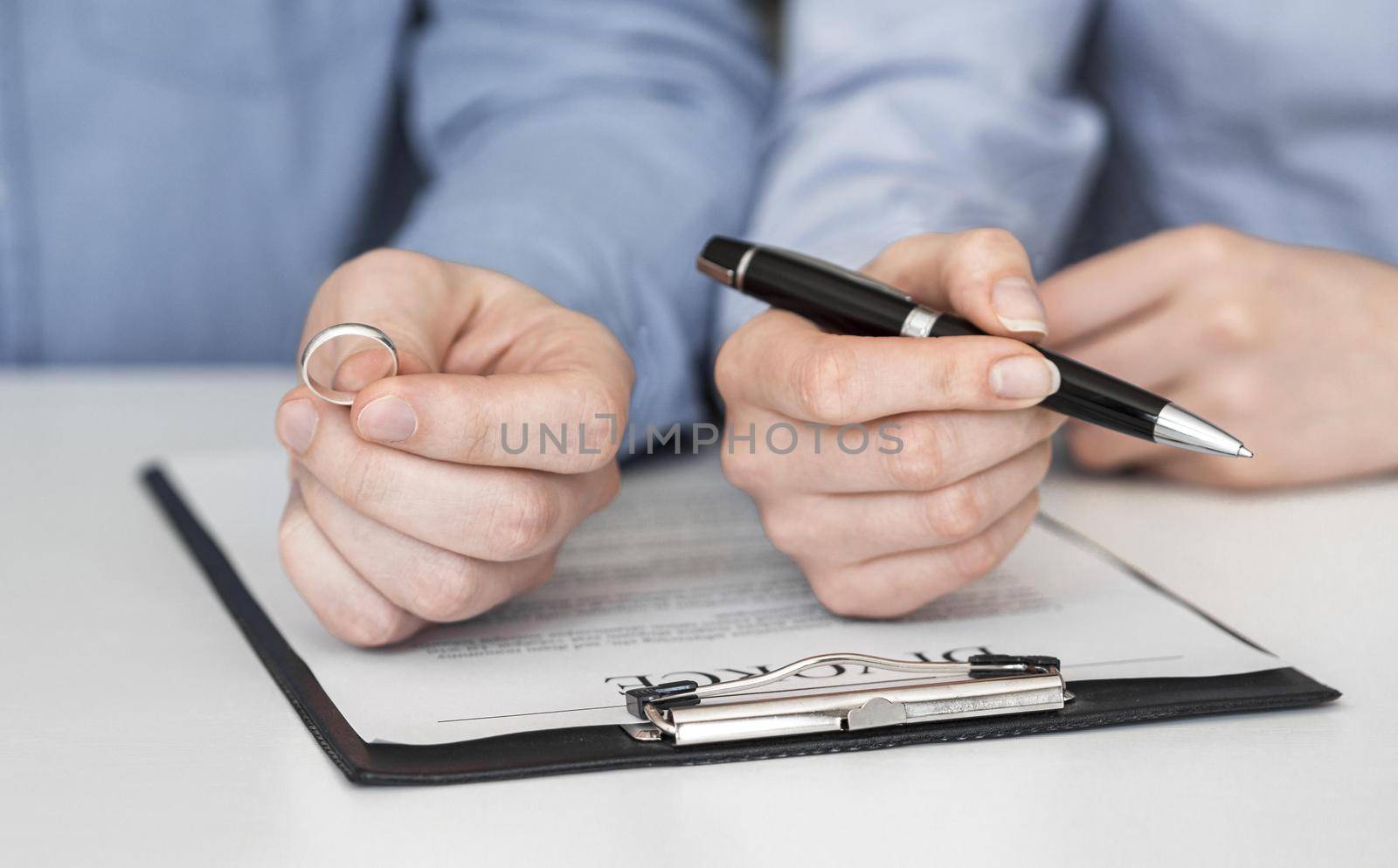 close up couple signing divorce contract. Resolution and high quality beautiful photo