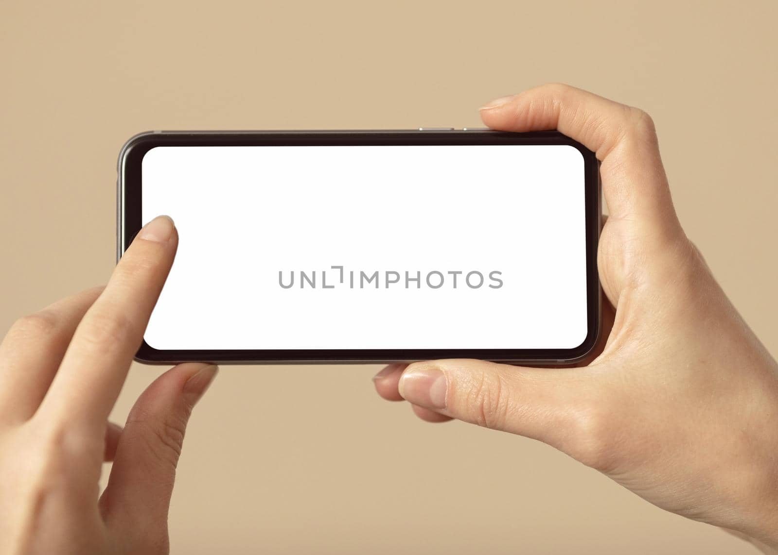 person holding mobile phone with white screen. Resolution and high quality beautiful photo