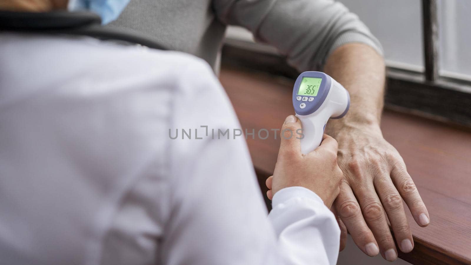 patient having his temperature checked 2. Resolution and high quality beautiful photo