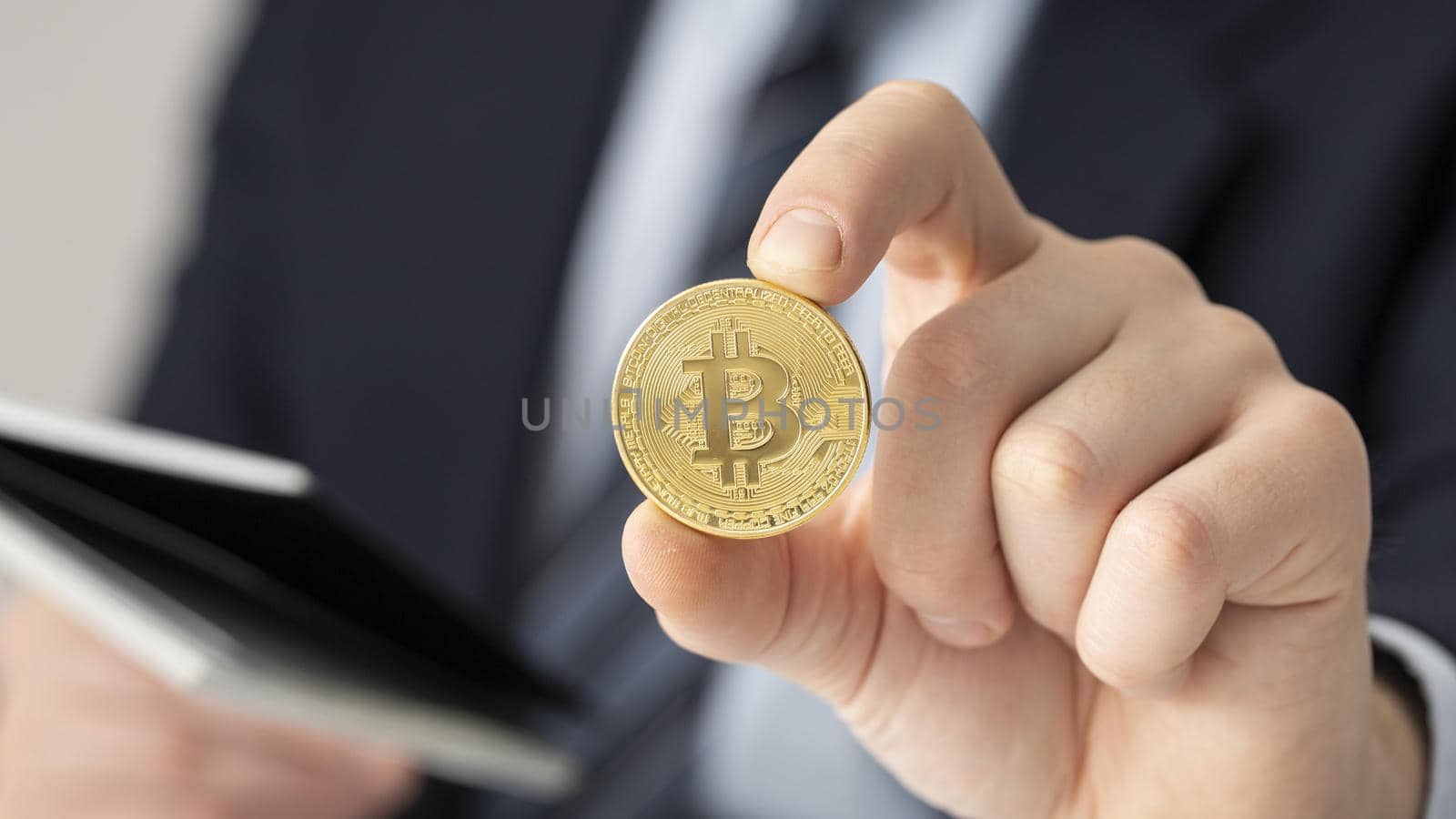 businessman holding bitcoin close up. Resolution and high quality beautiful photo