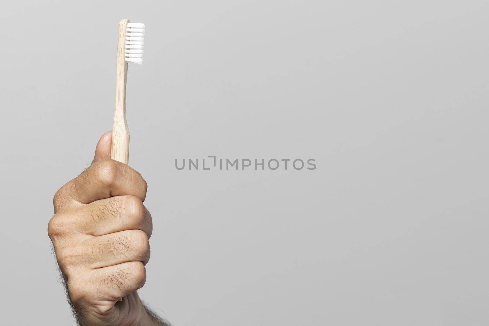 close up hand holding toothbrush. Resolution and high quality beautiful photo