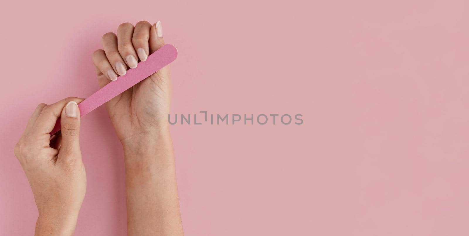close up hand using nail file. Resolution and high quality beautiful photo