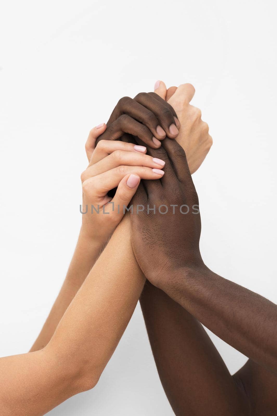 multiracial hands coming together 3. High quality beautiful photo concept by Zahard