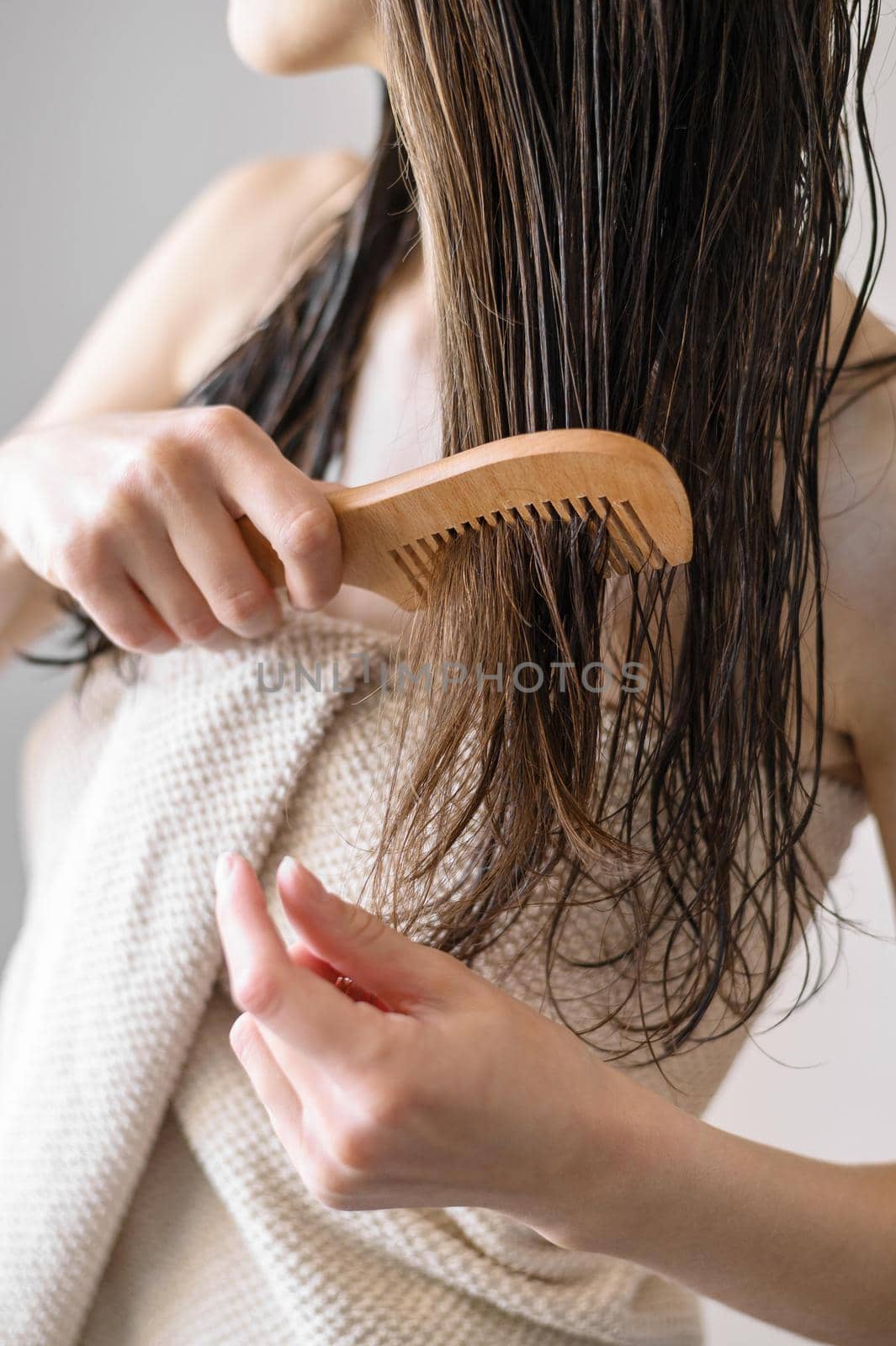 close up woman combing hair. Resolution and high quality beautiful photo