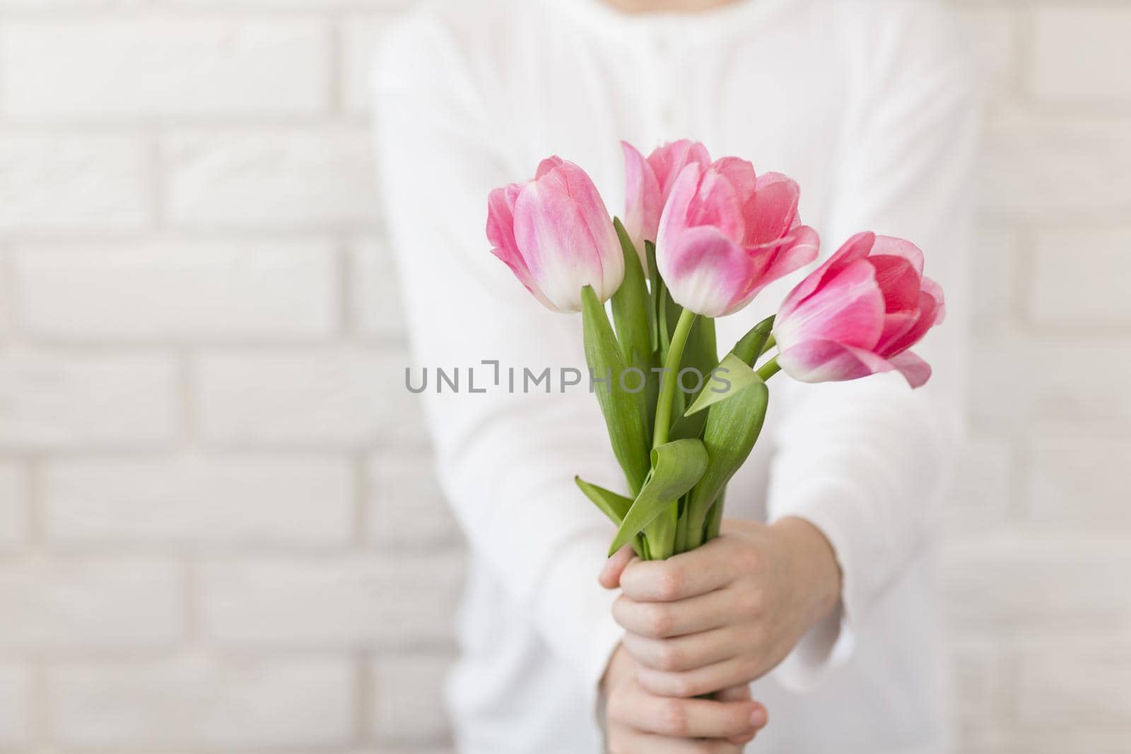 close up boy holding flowers. Resolution and high quality beautiful photo