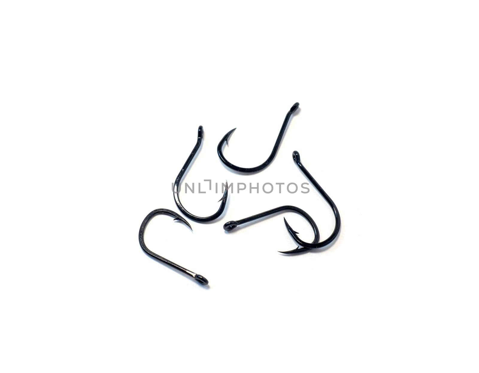 fish hooks for catching carp on a white background
