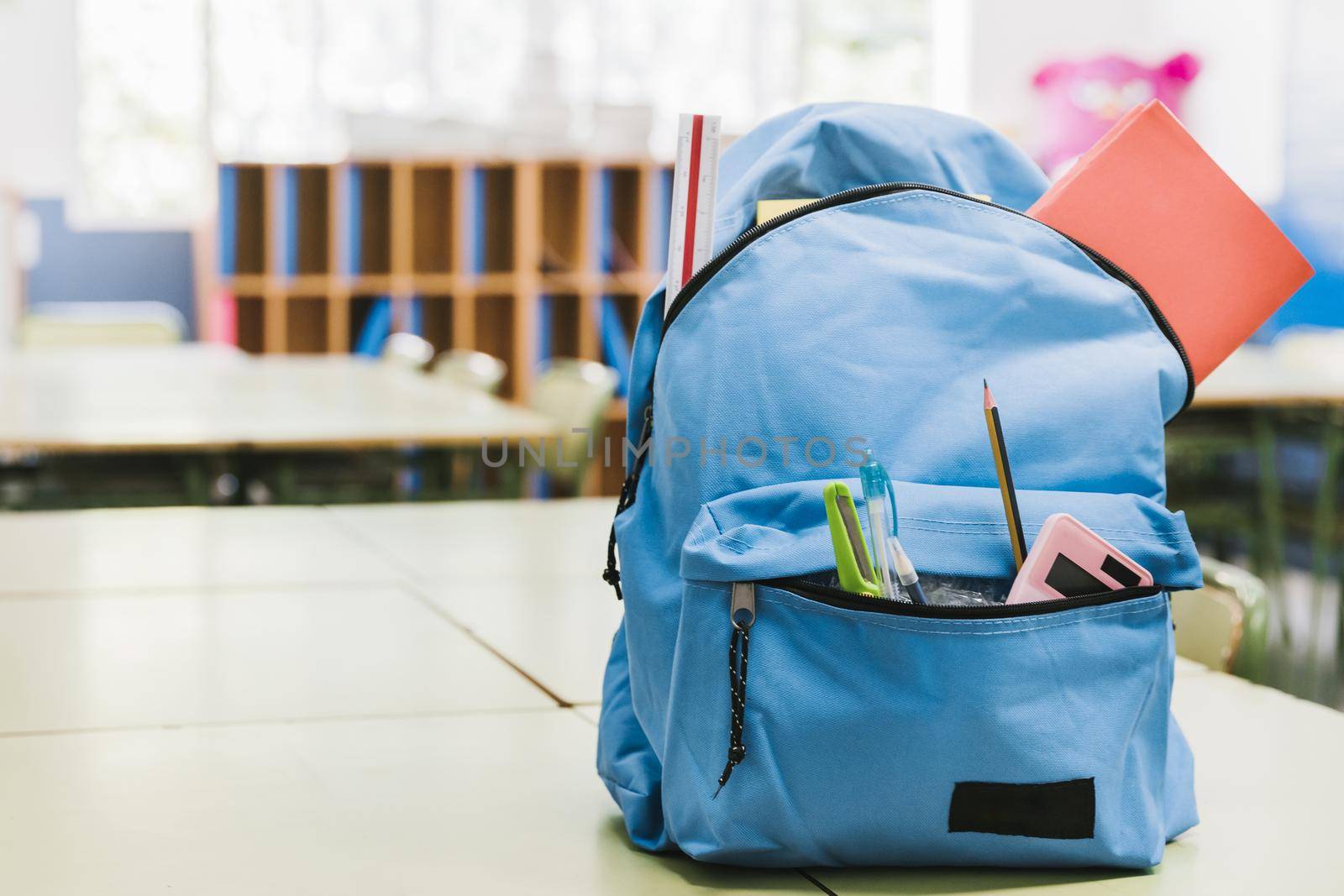 blue schoolchild backpack table. Resolution and high quality beautiful photo