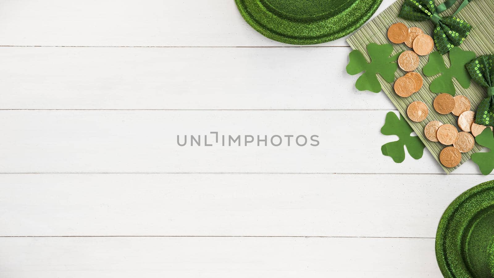 composition bow ties near hats coins green paper clovers board. Resolution and high quality beautiful photo